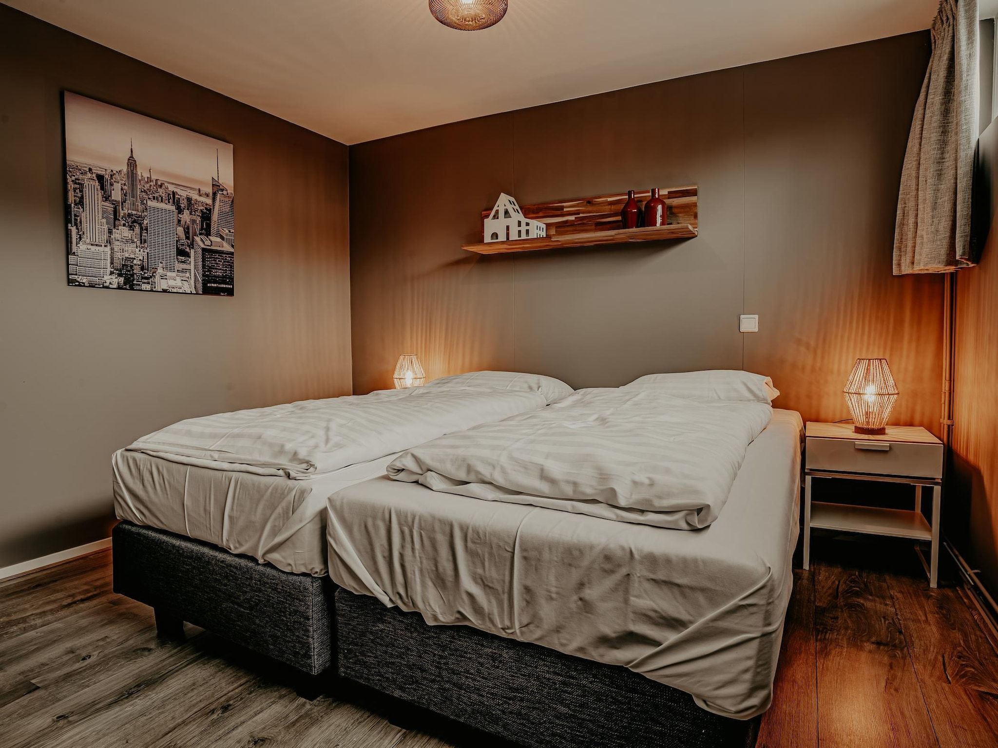 Een slaapkamer van Waterpark de Meerparel 5 in Uitgeest