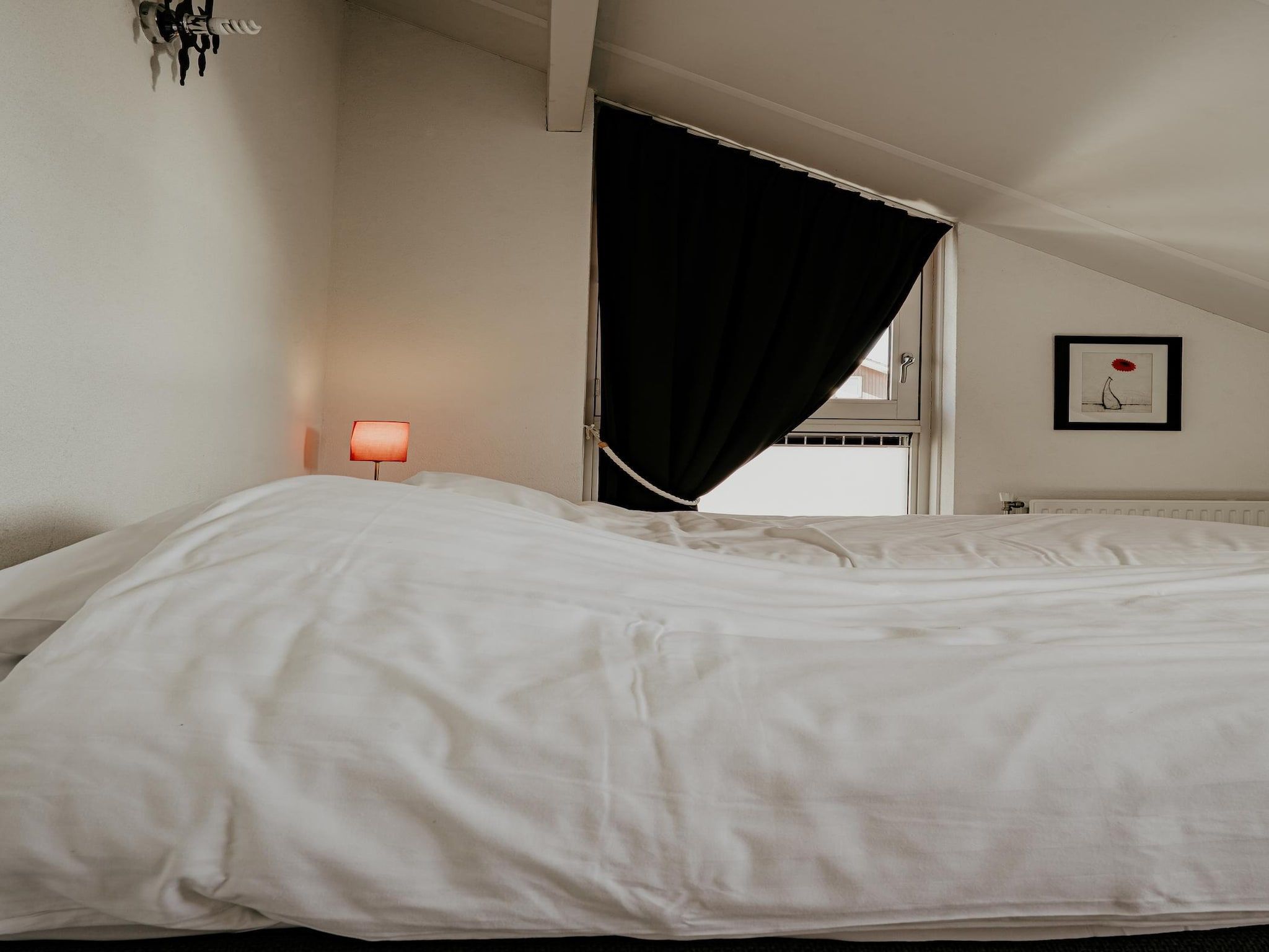 Een slaapkamer van Waterpark de Meerparel 4 in Uitgeest