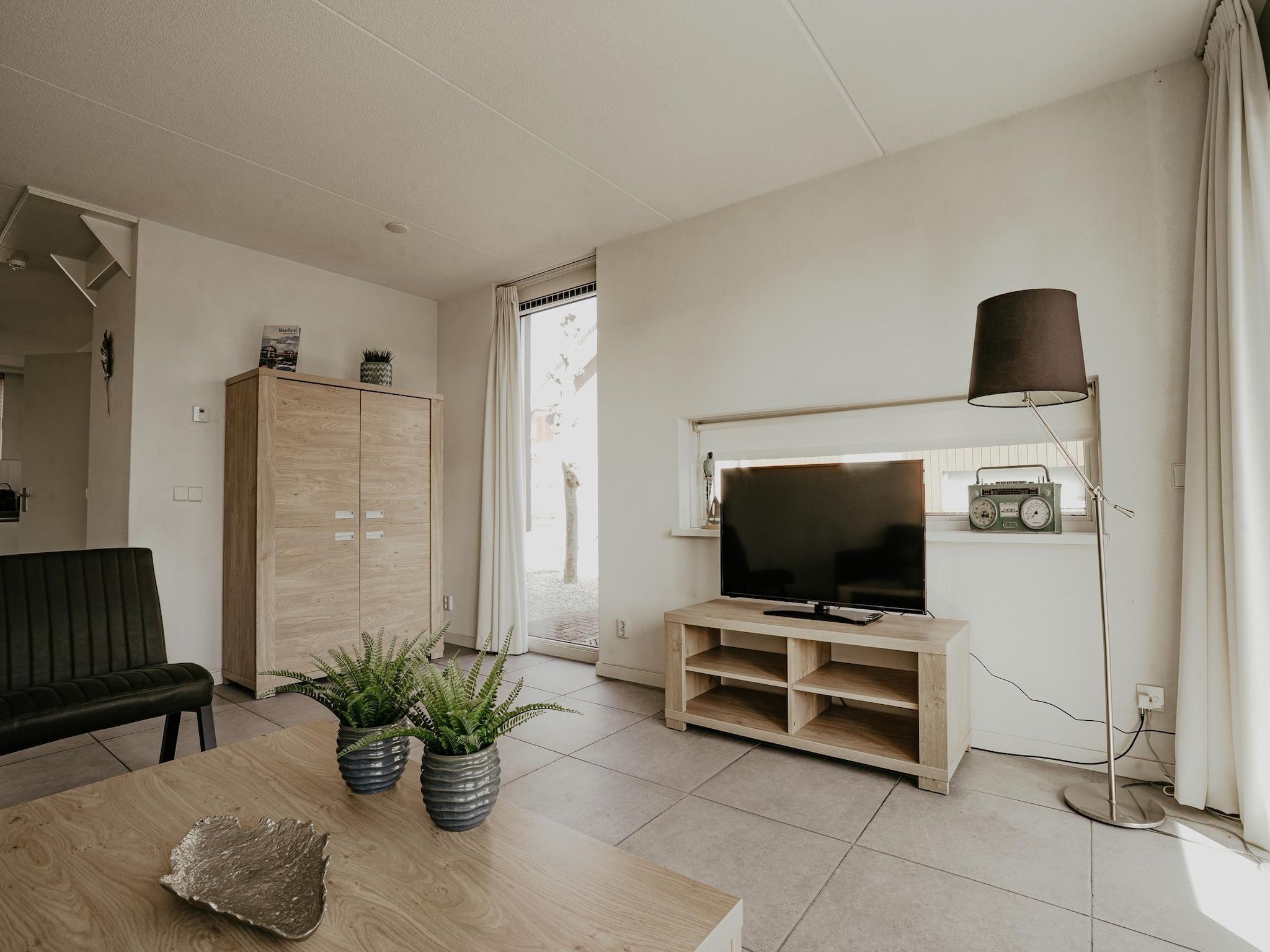 De woonkamer van Waterpark de Meerparel 4 in Uitgeest