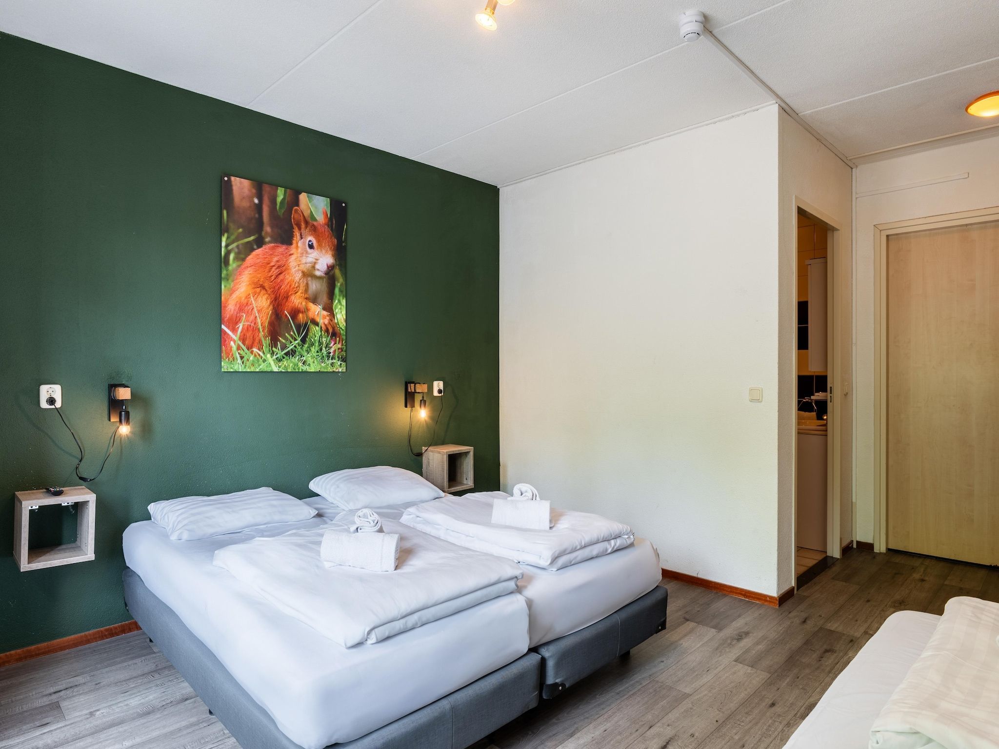 Een slaapkamer van Hunzepark 10 in Gasselternijveen