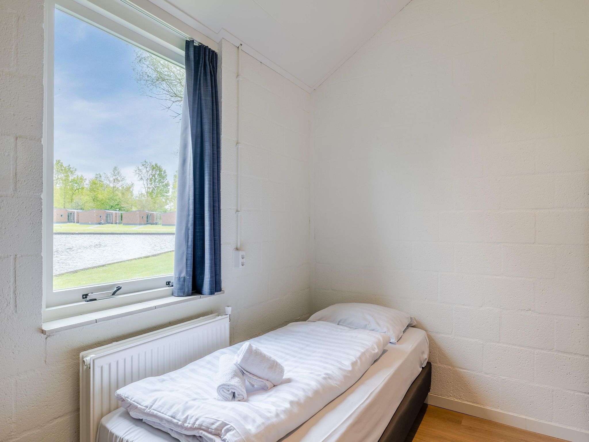 Een slaapkamer van Hunzepark 9 in Gasselternijveen