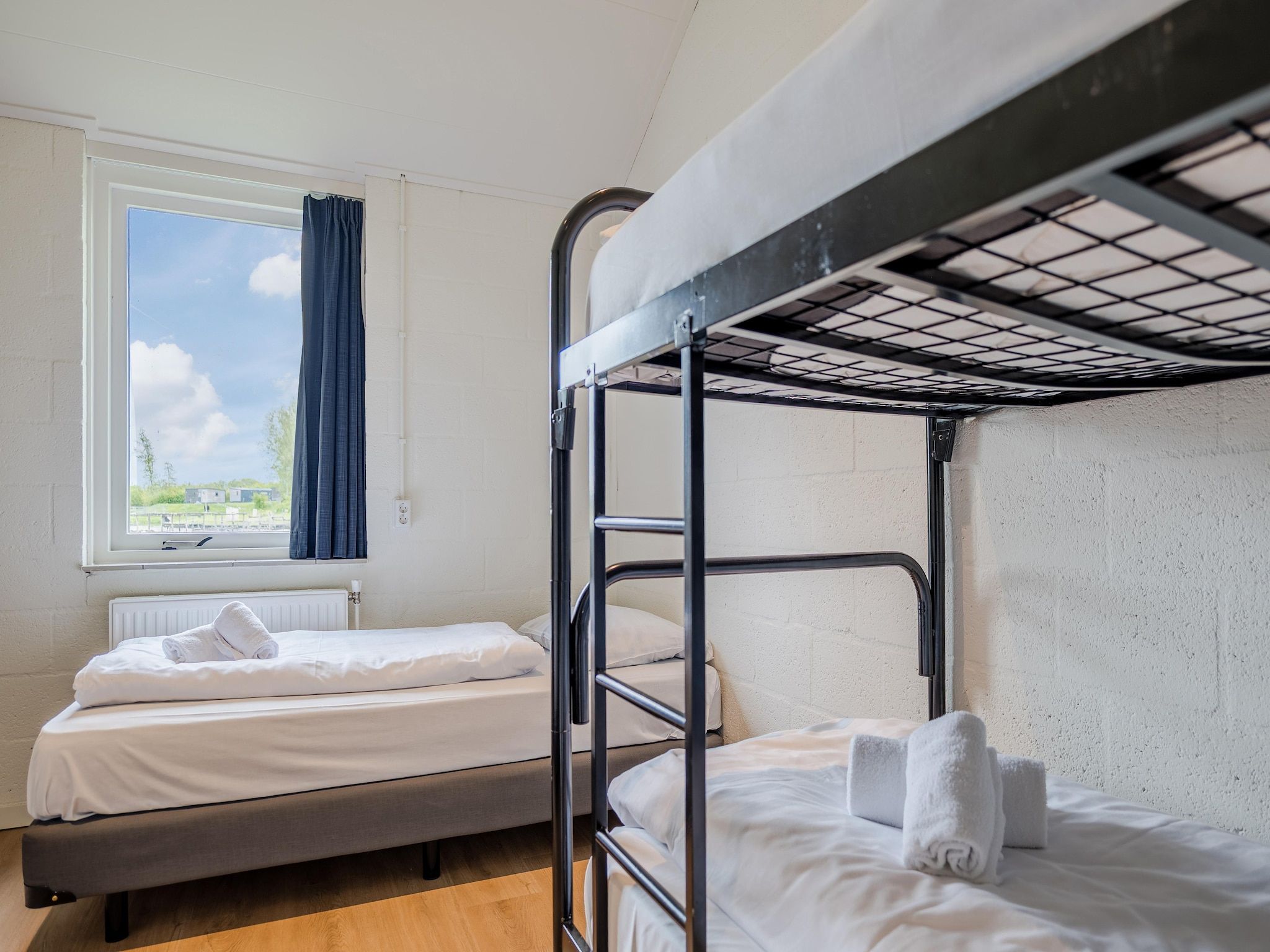 Een slaapkamer van Hunzepark 9 in Gasselternijveen