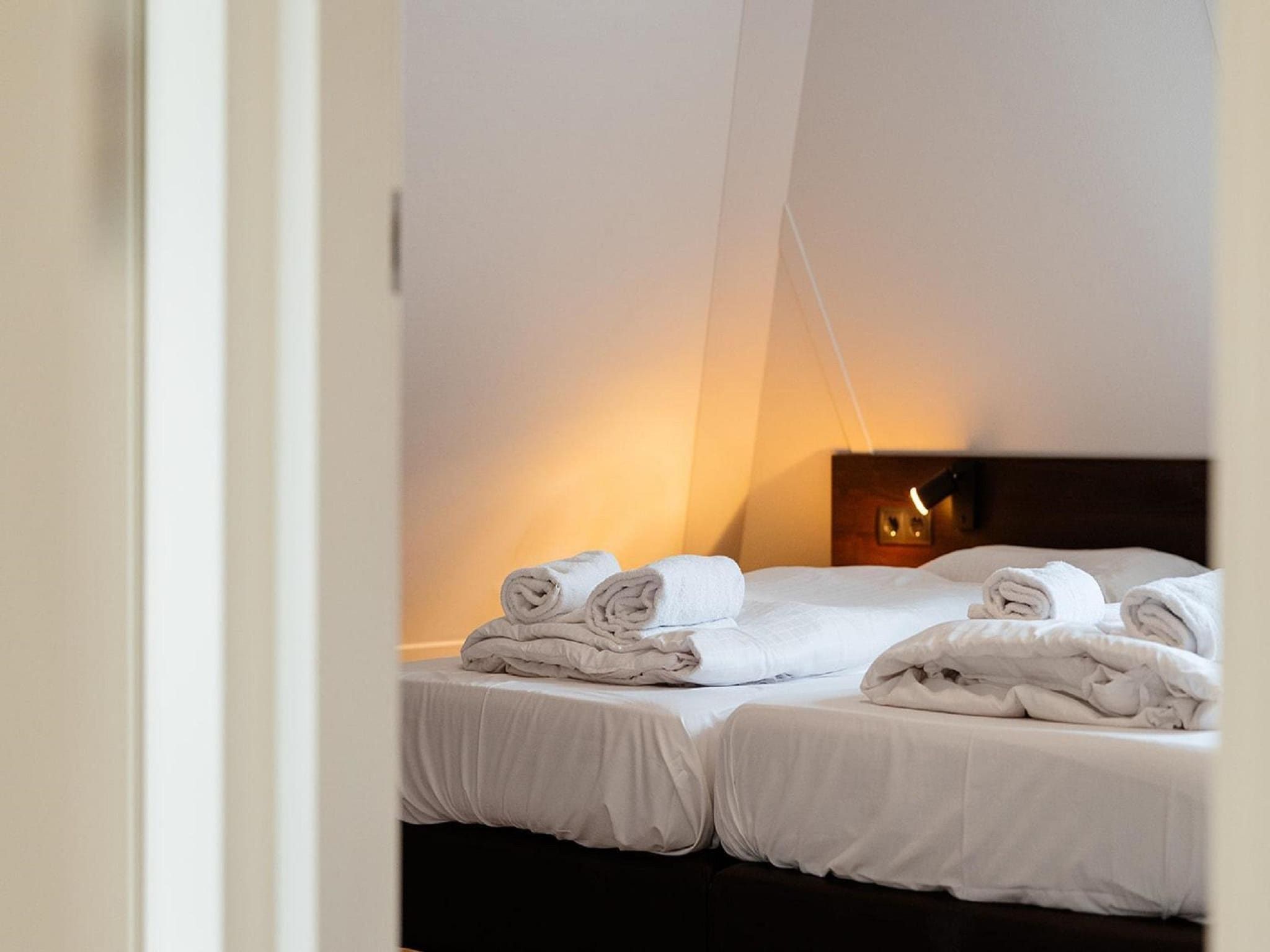 Een slaapkamer van Landgoed De IJsvogel 2 in Voorthuizen