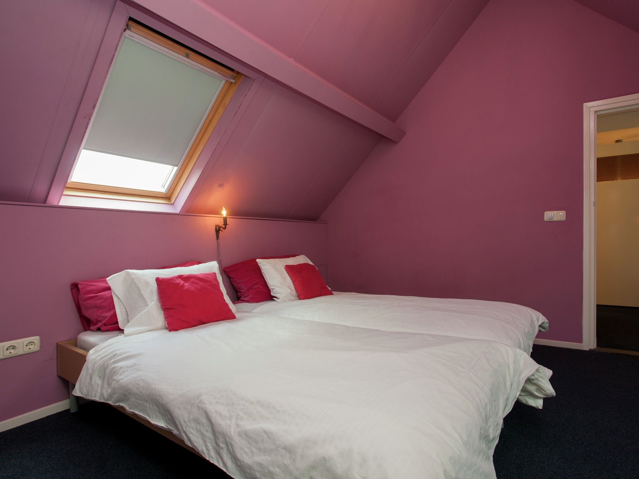 Een slaapkamer van Dorpswoning Het Landelijke in Leende