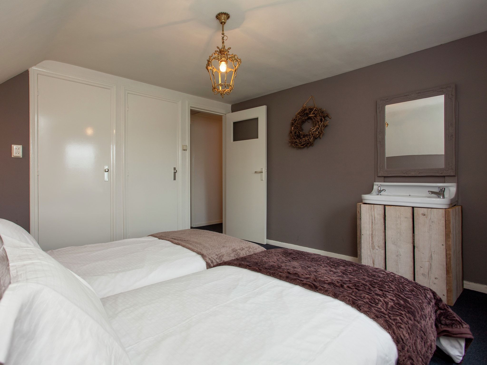 Een slaapkamer van Dorpswoning Het Landelijke in Leende