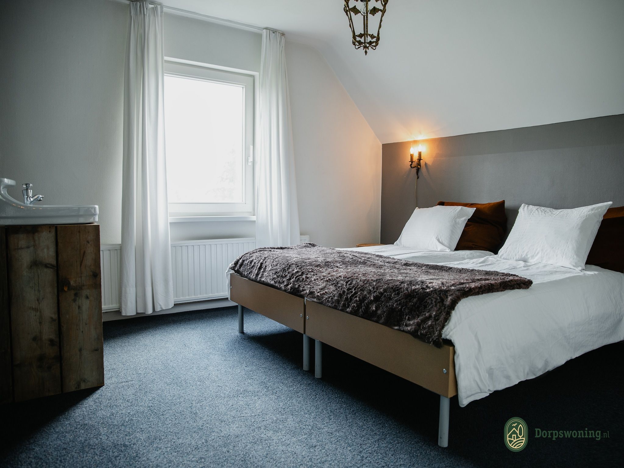 Een slaapkamer van Dorpswoning Het Landelijke in Leende