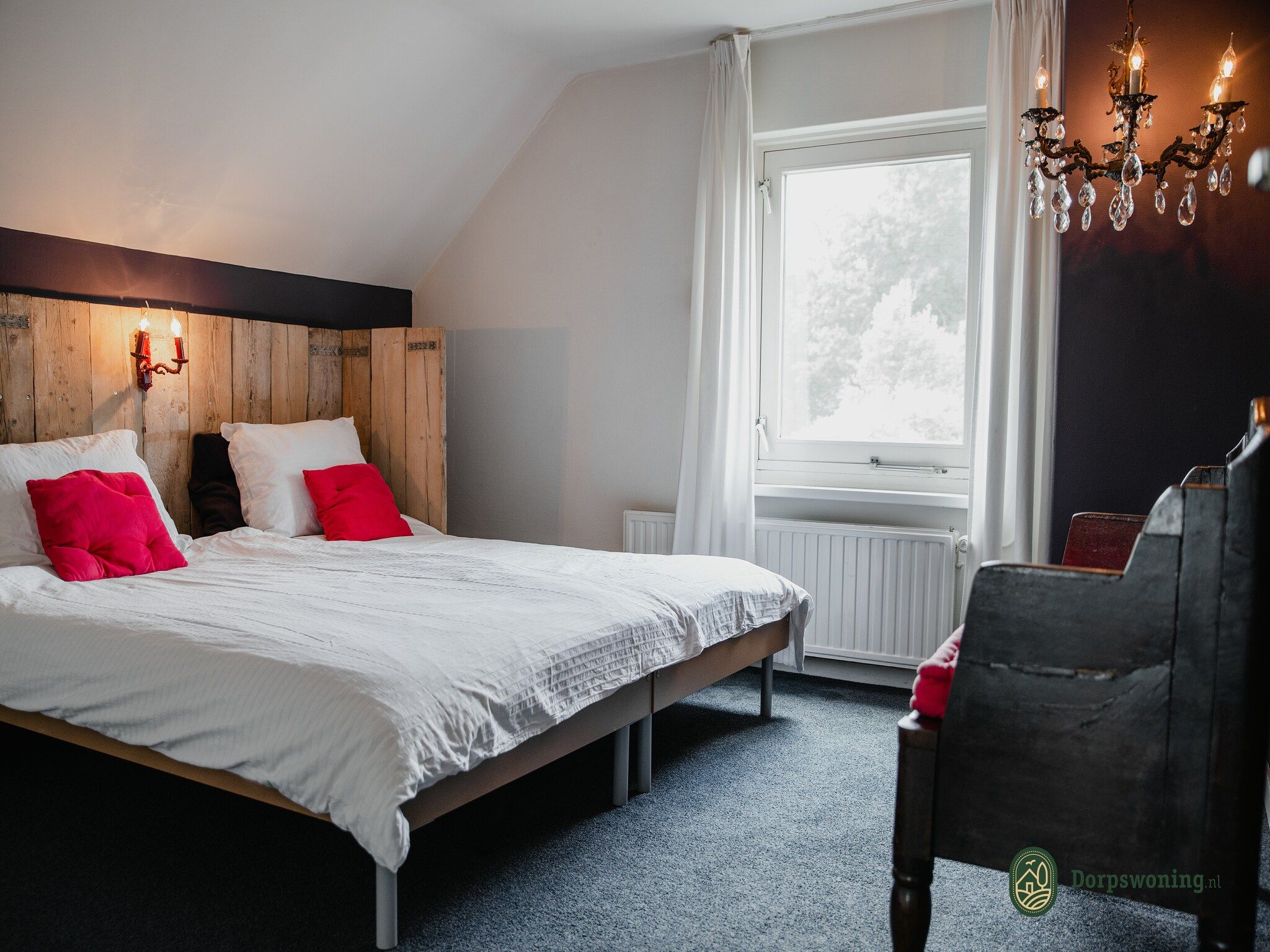 Een slaapkamer van Dorpswoning Het Landelijke in Leende