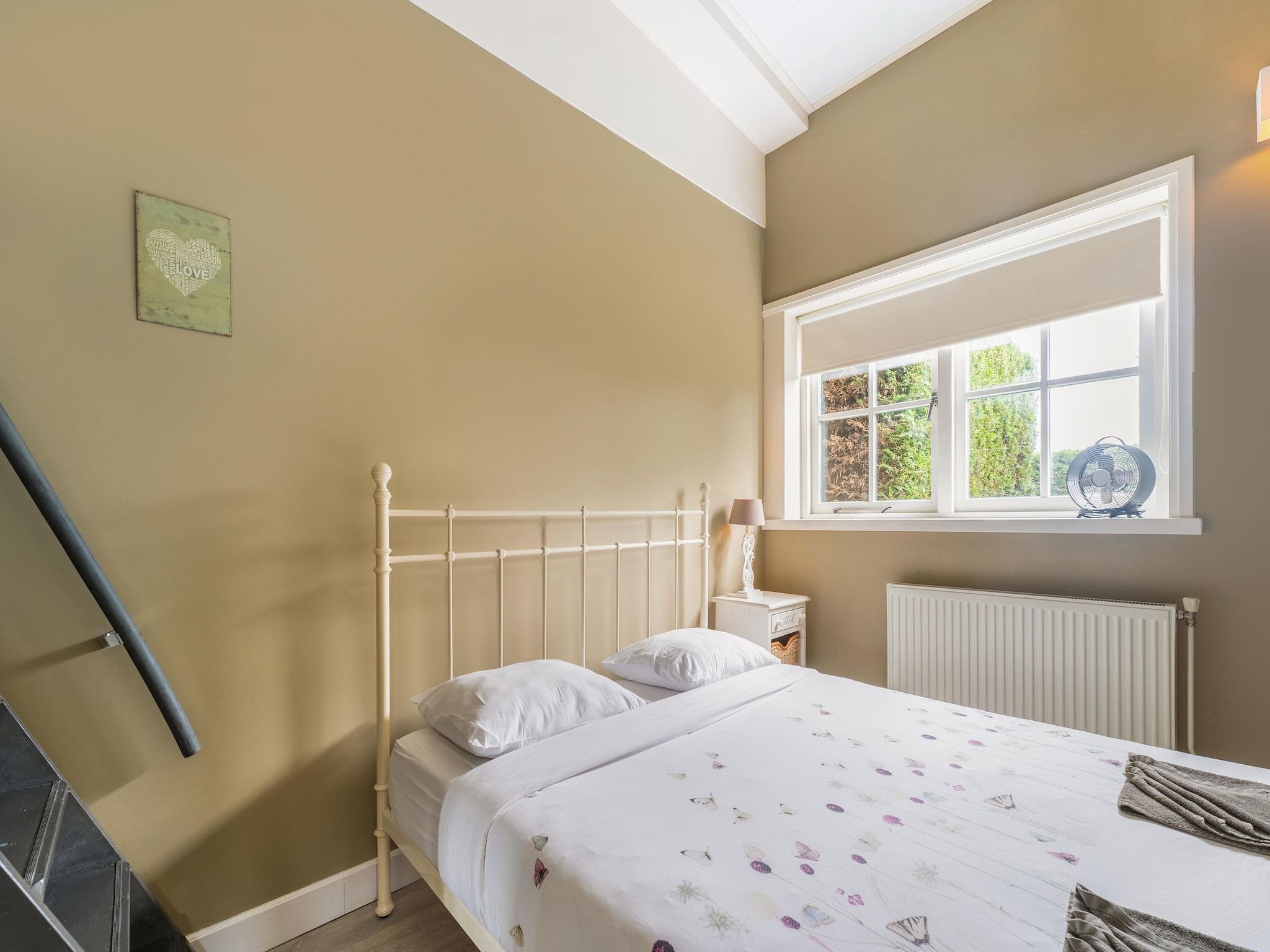 Een slaapkamer van Naast het Bollenveld in Egmond-Binnen