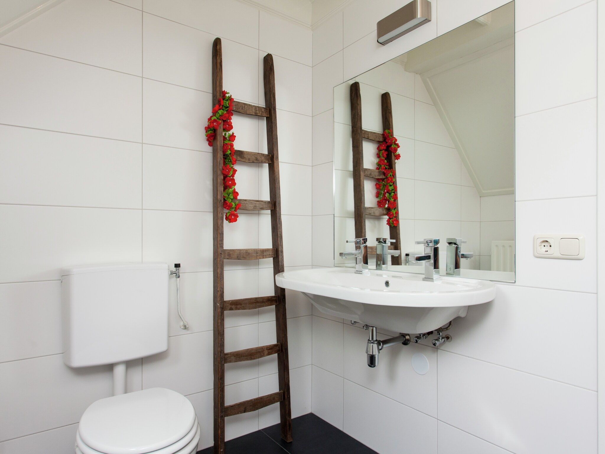 De badkamer van Dorpswoning De Plek in Leende