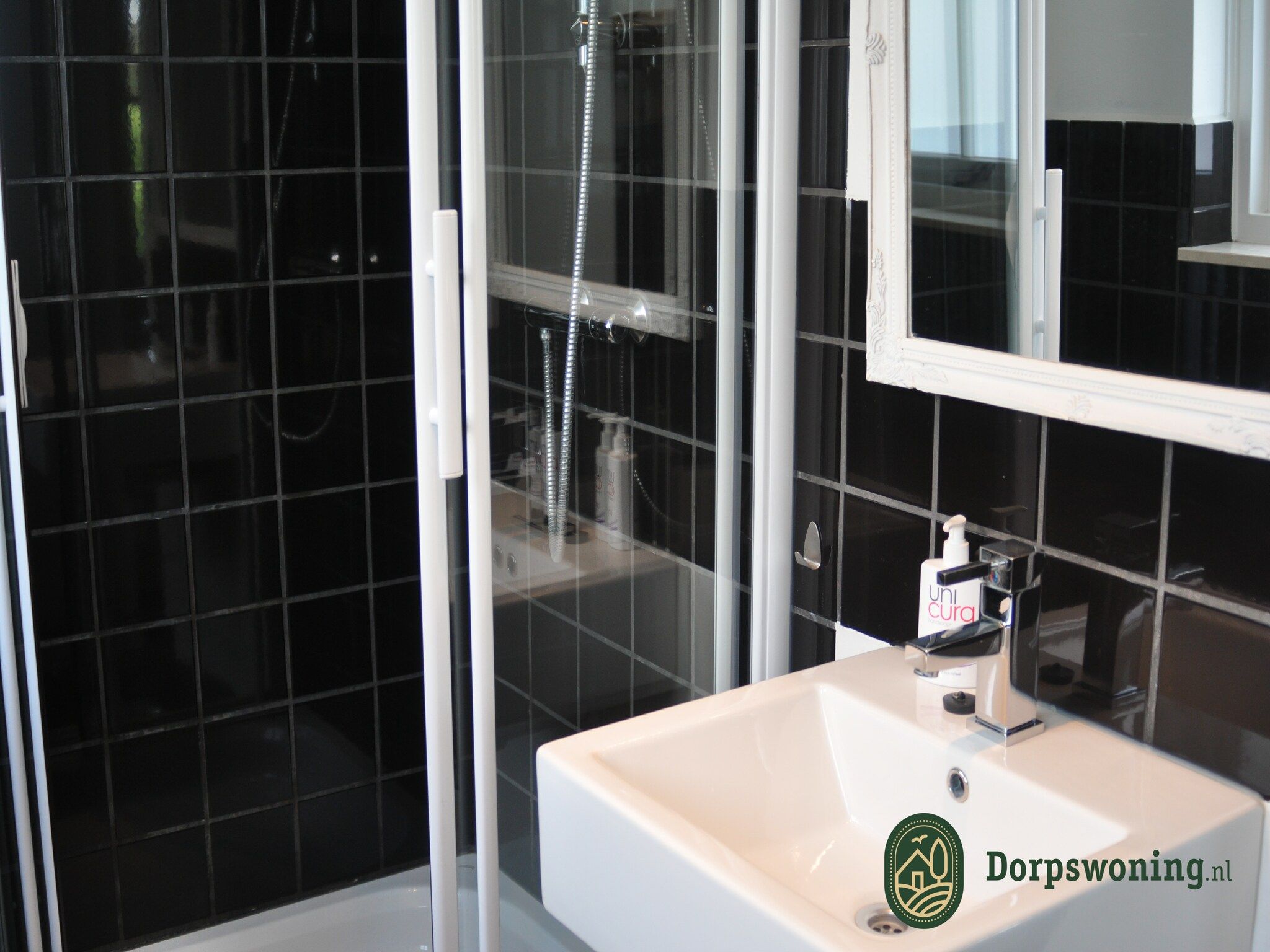 De badkamer van Dorpswoning De Plek in Leende