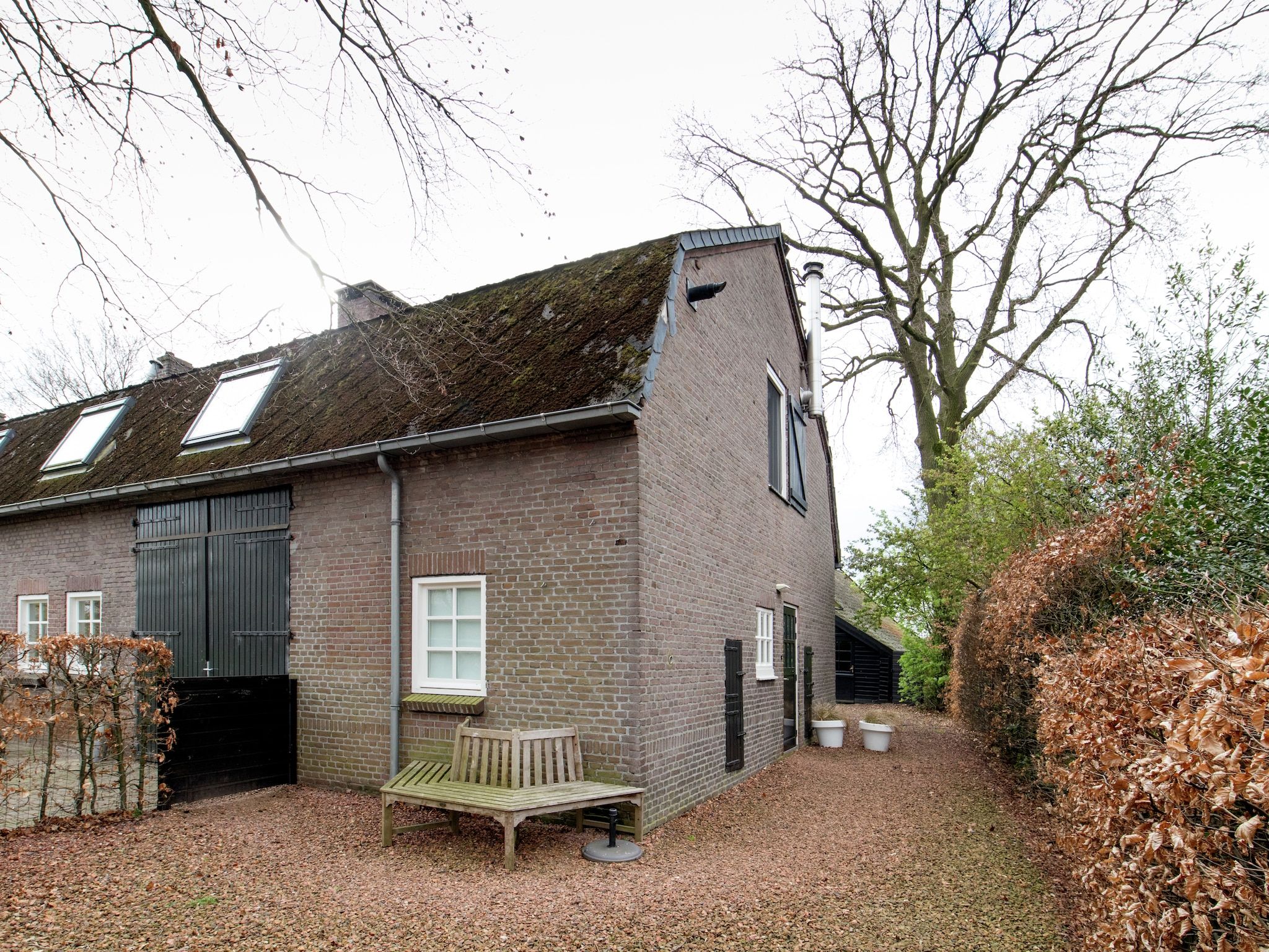 De tuin van Dorpswoning Op Niveau in Leende