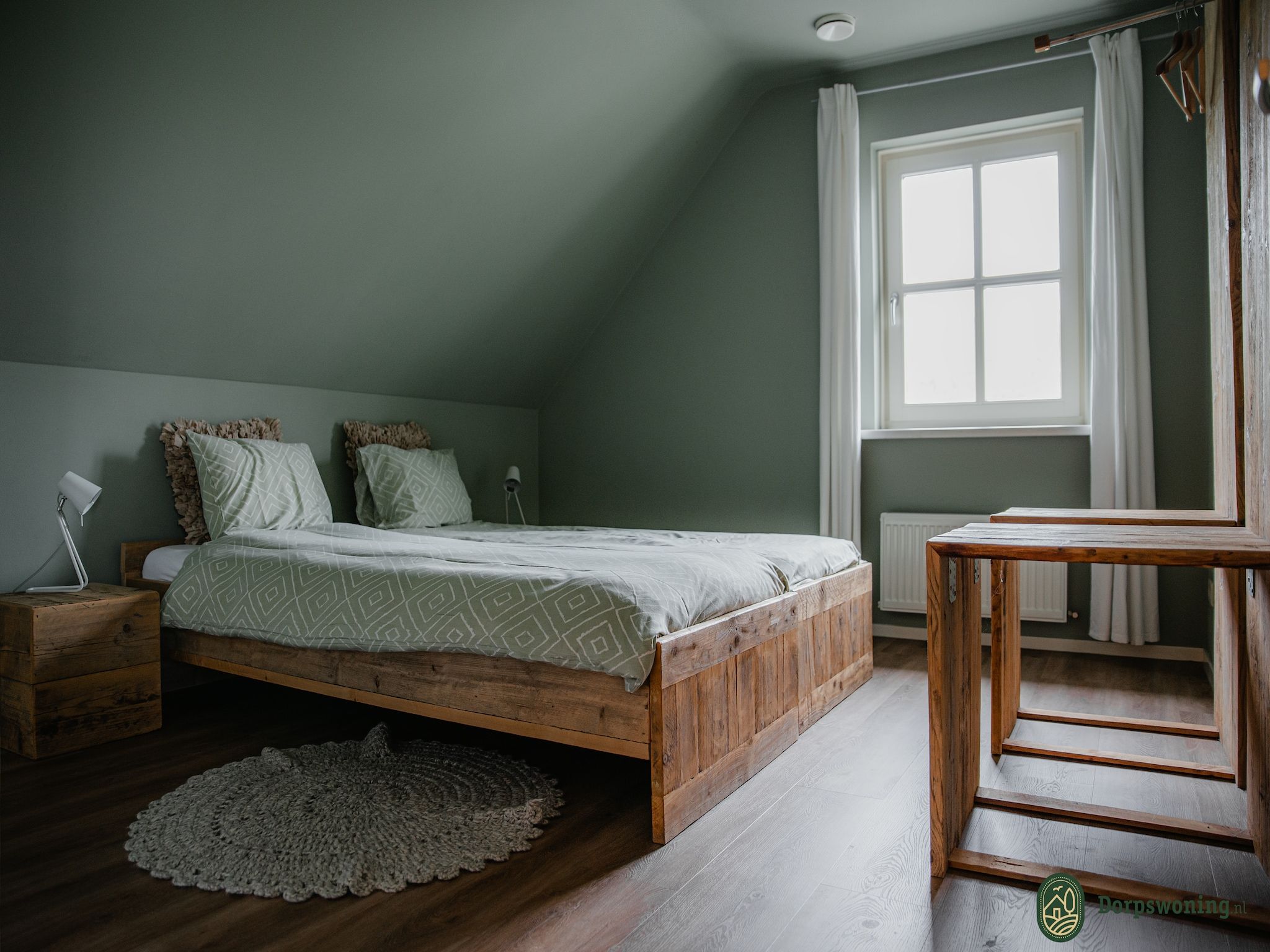 Een slaapkamer van Dorpswoning Het Uitzicht in Leende