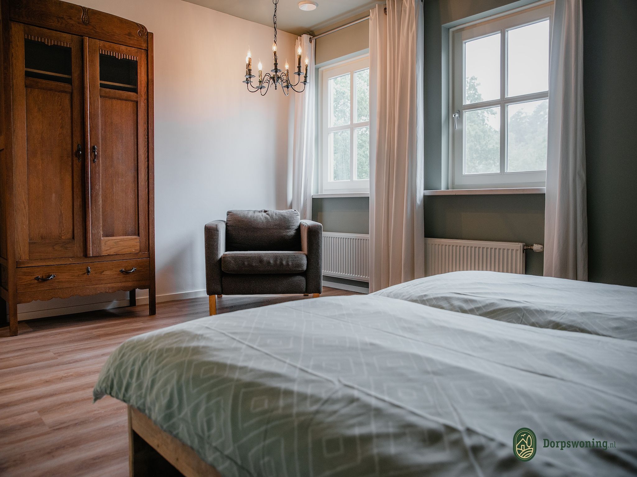 Een slaapkamer van Dorpswoning Het Uitzicht in Leende