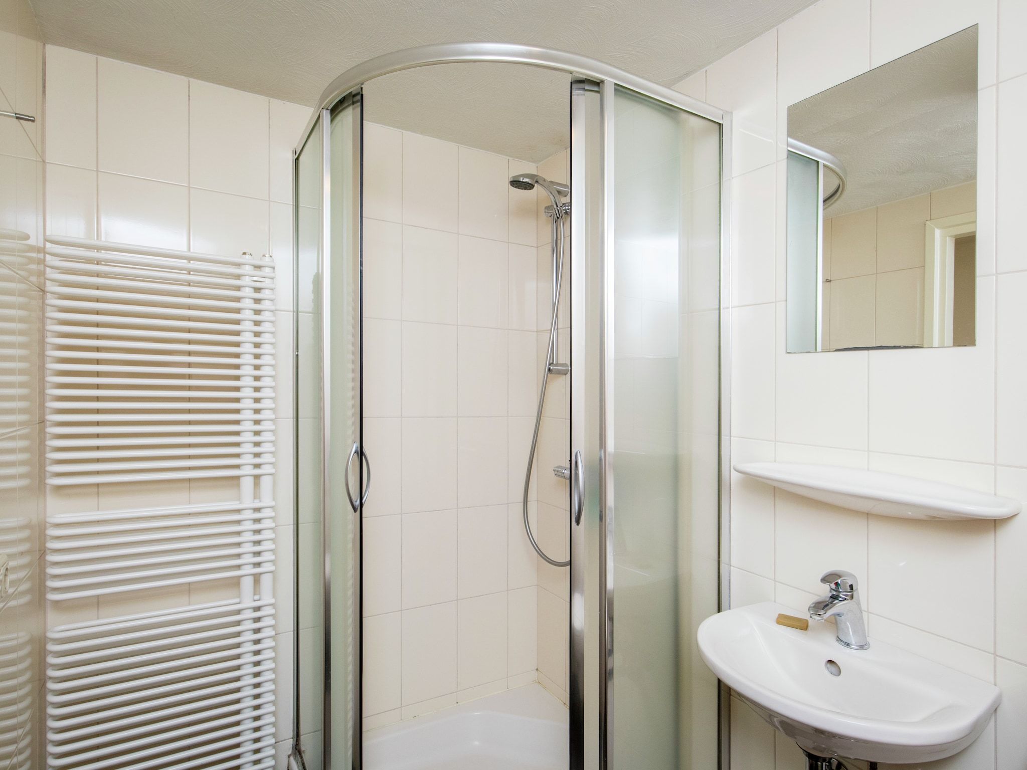 De badkamer van Dorpswoning Het Knusse in Leende