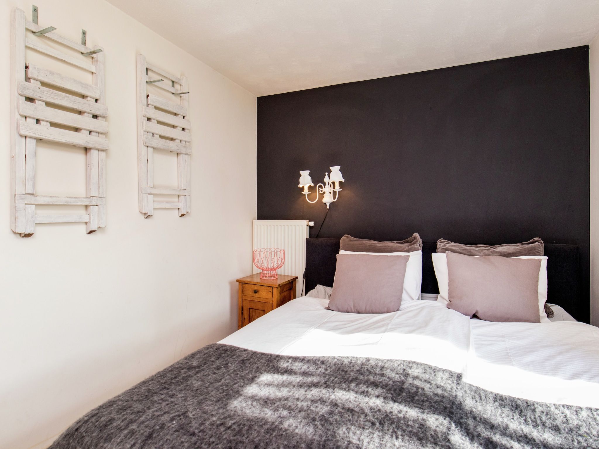 Een slaapkamer van Dorpswoning Het Knusse in Leende