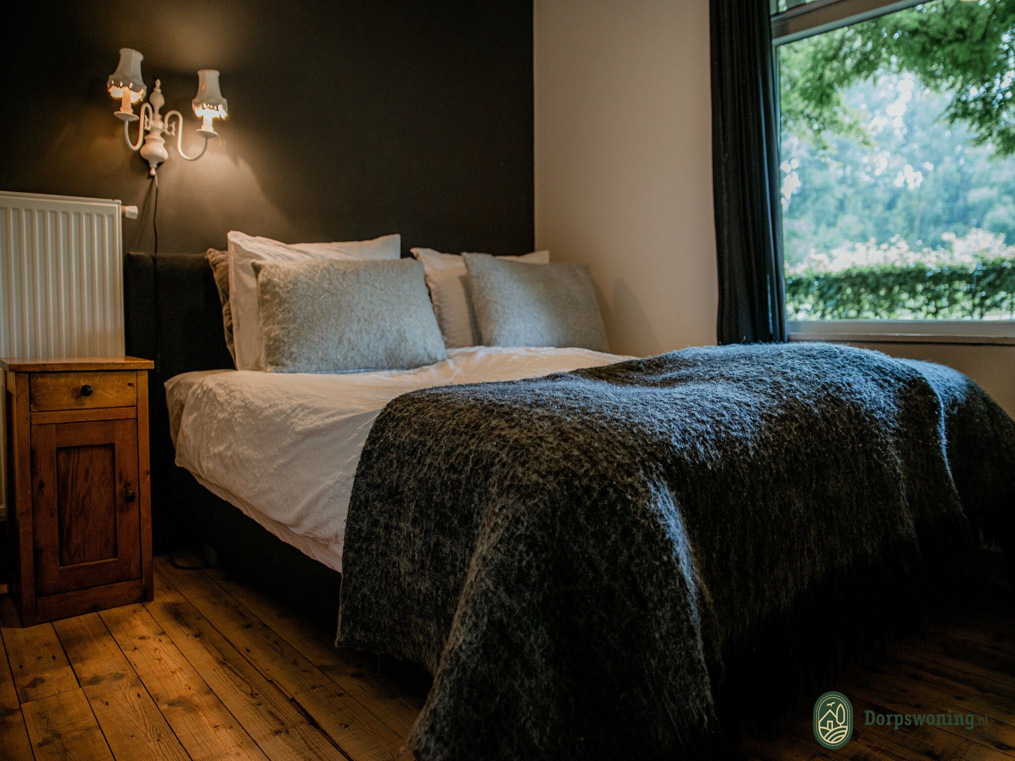 Een slaapkamer van Dorpswoning Het Knusse in Leende