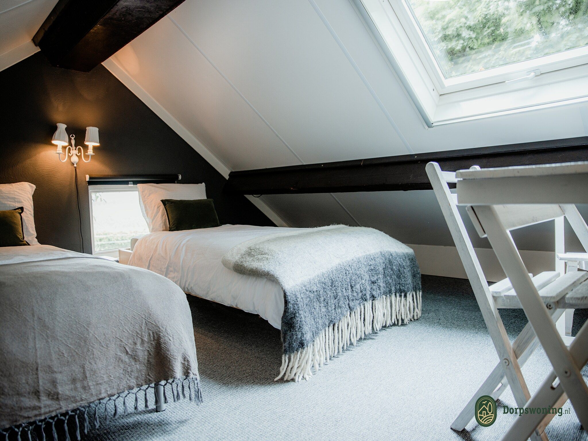 Een slaapkamer van Dorpswoning Het Knusse in Leende