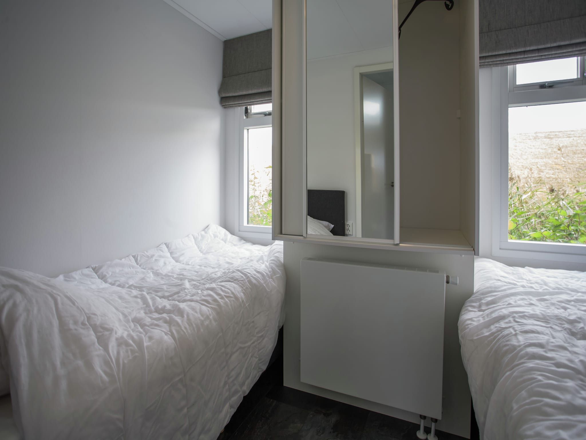 Een slaapkamer van Aan de Oosterschelde in Kattendijke