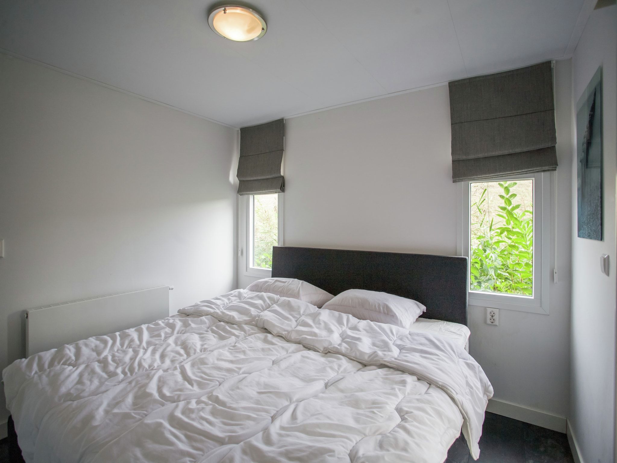 Een slaapkamer van Aan de Oosterschelde in Kattendijke