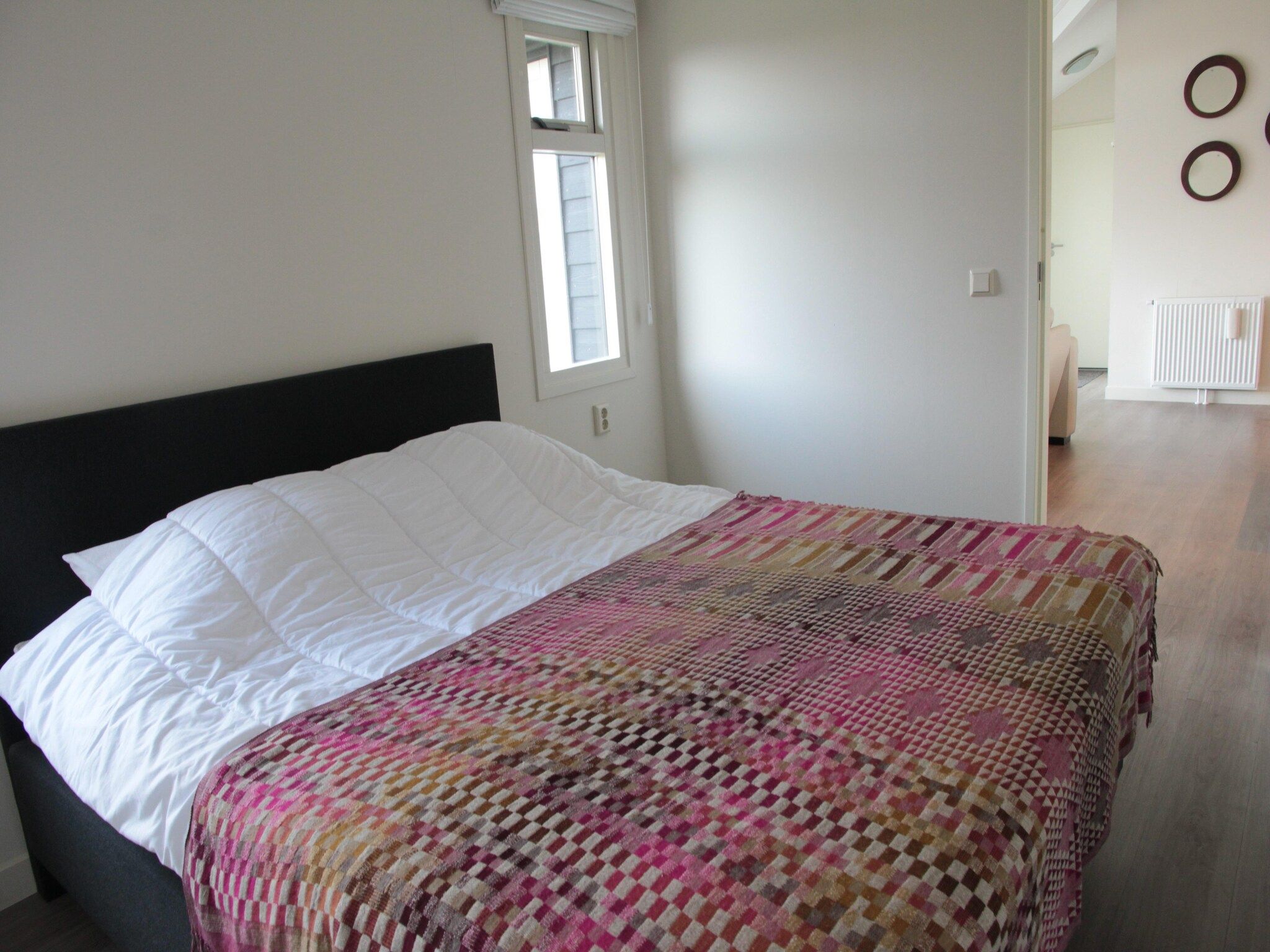 Een slaapkamer van Sunny Oosterschelde in Kattendijke