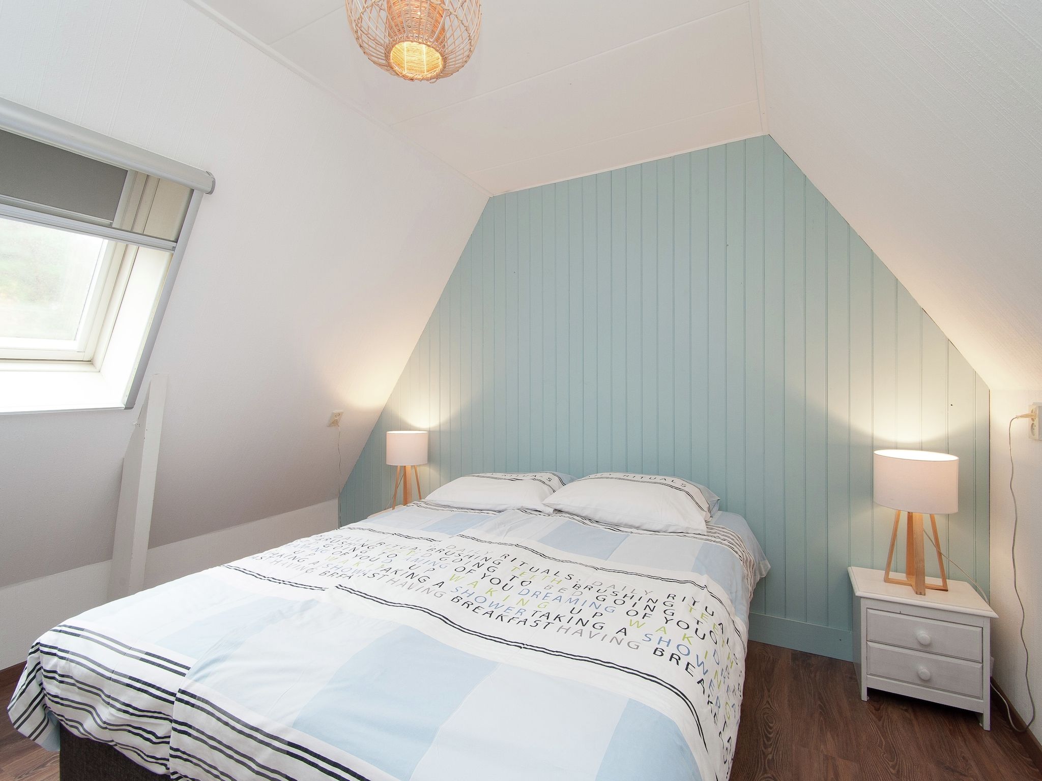 Een slaapkamer van Huize Glory Amethist aan Zee in Bergen aan zee