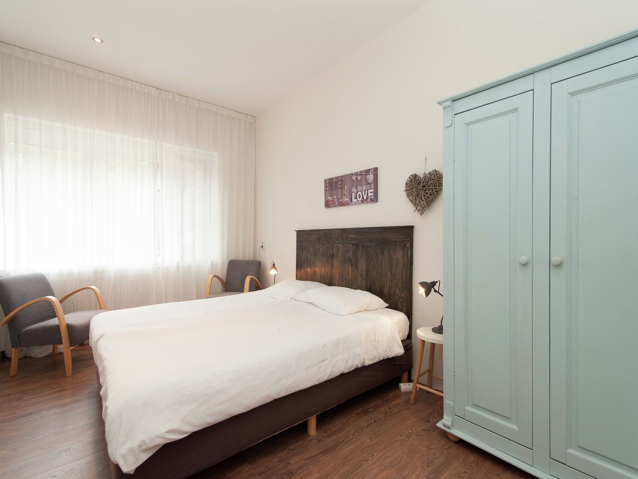 Een slaapkamer van Huize Glory Amethist aan Zee in Bergen aan zee