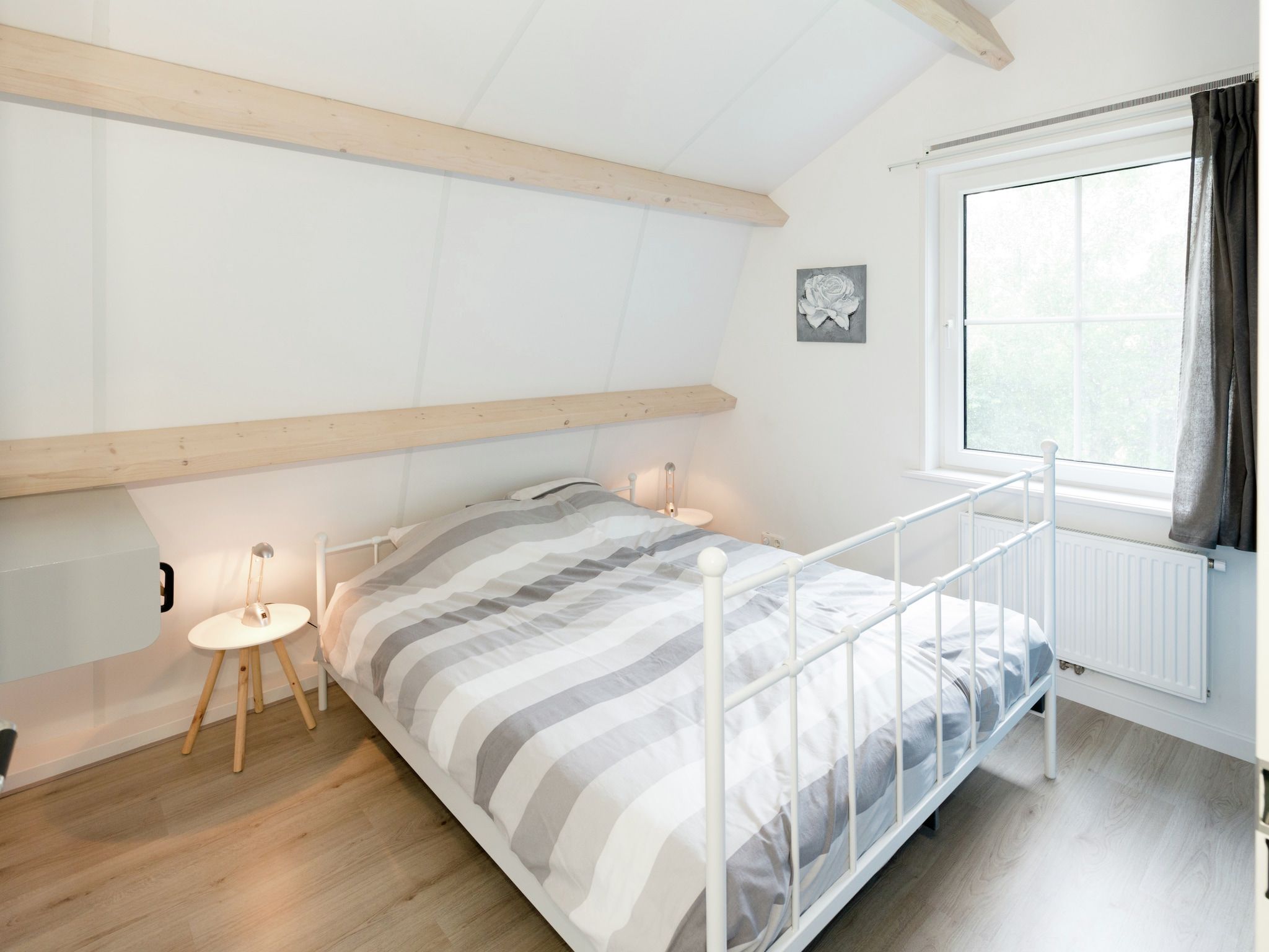 Een slaapkamer van Opvakantiebijdeboer in Schellinkhout