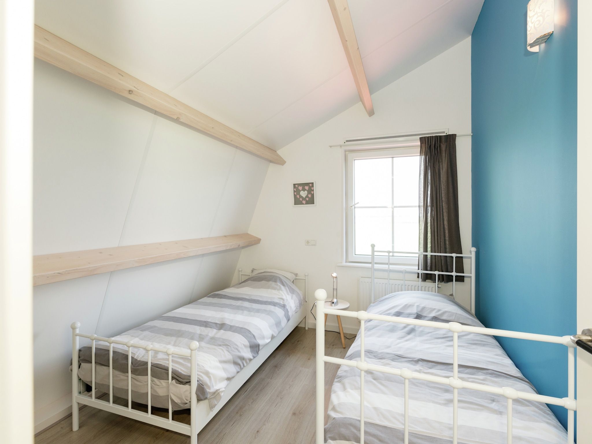 Een slaapkamer van Opvakantiebijdeboer in Schellinkhout