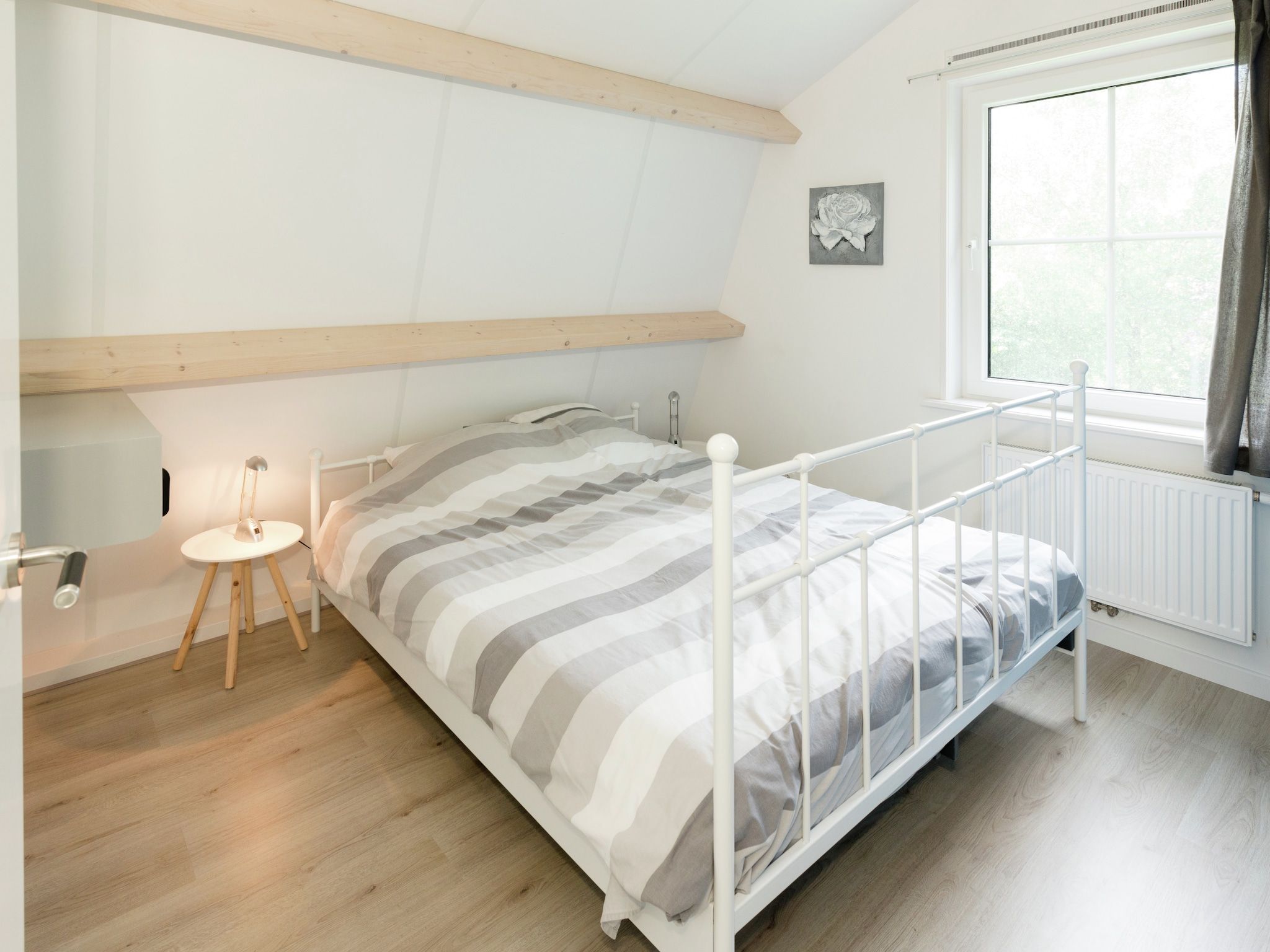 Een slaapkamer van Opvakantiebijdeboer in Schellinkhout