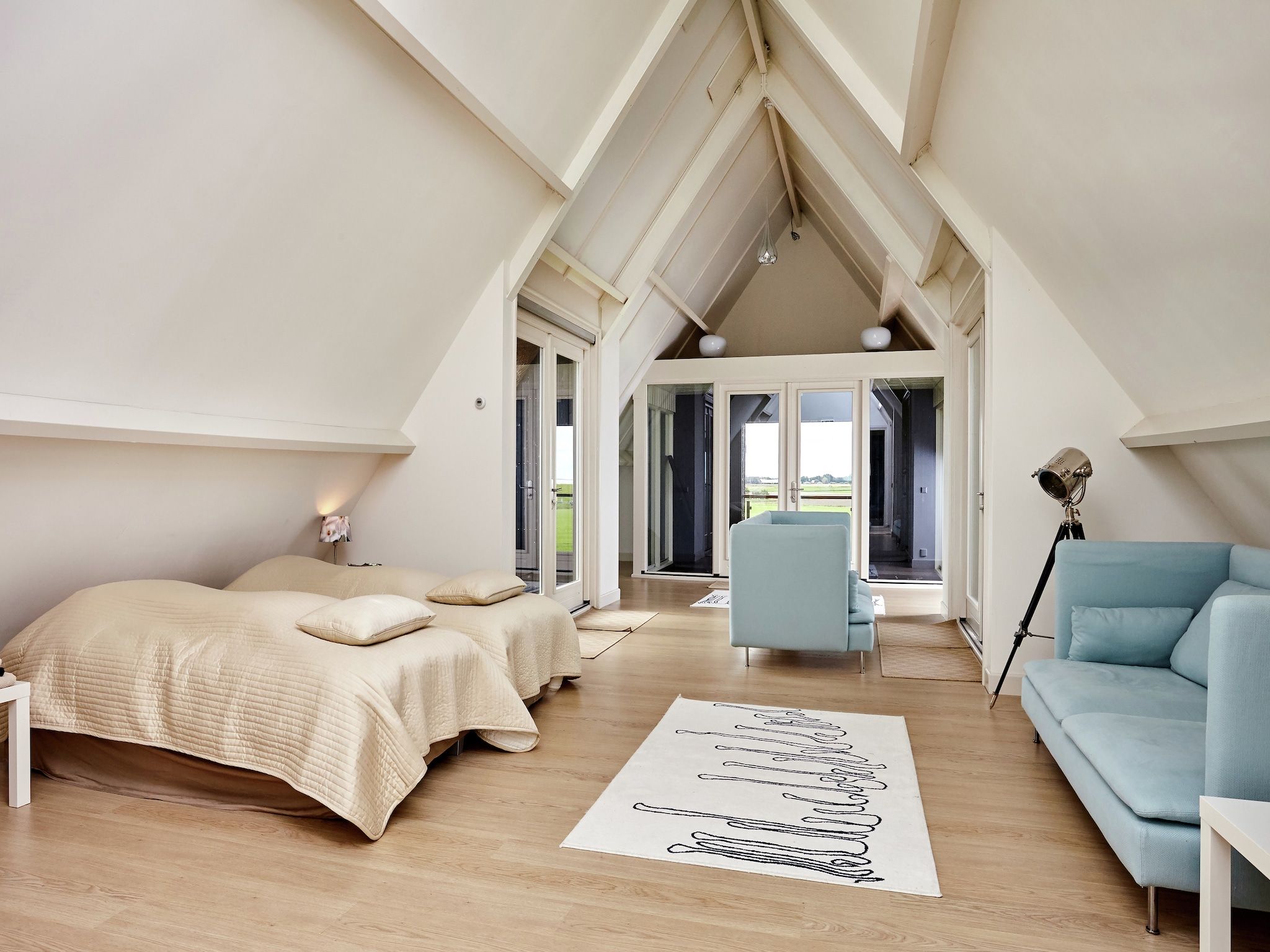 Een slaapkamer van Landhuis Wad Anders in Wierum