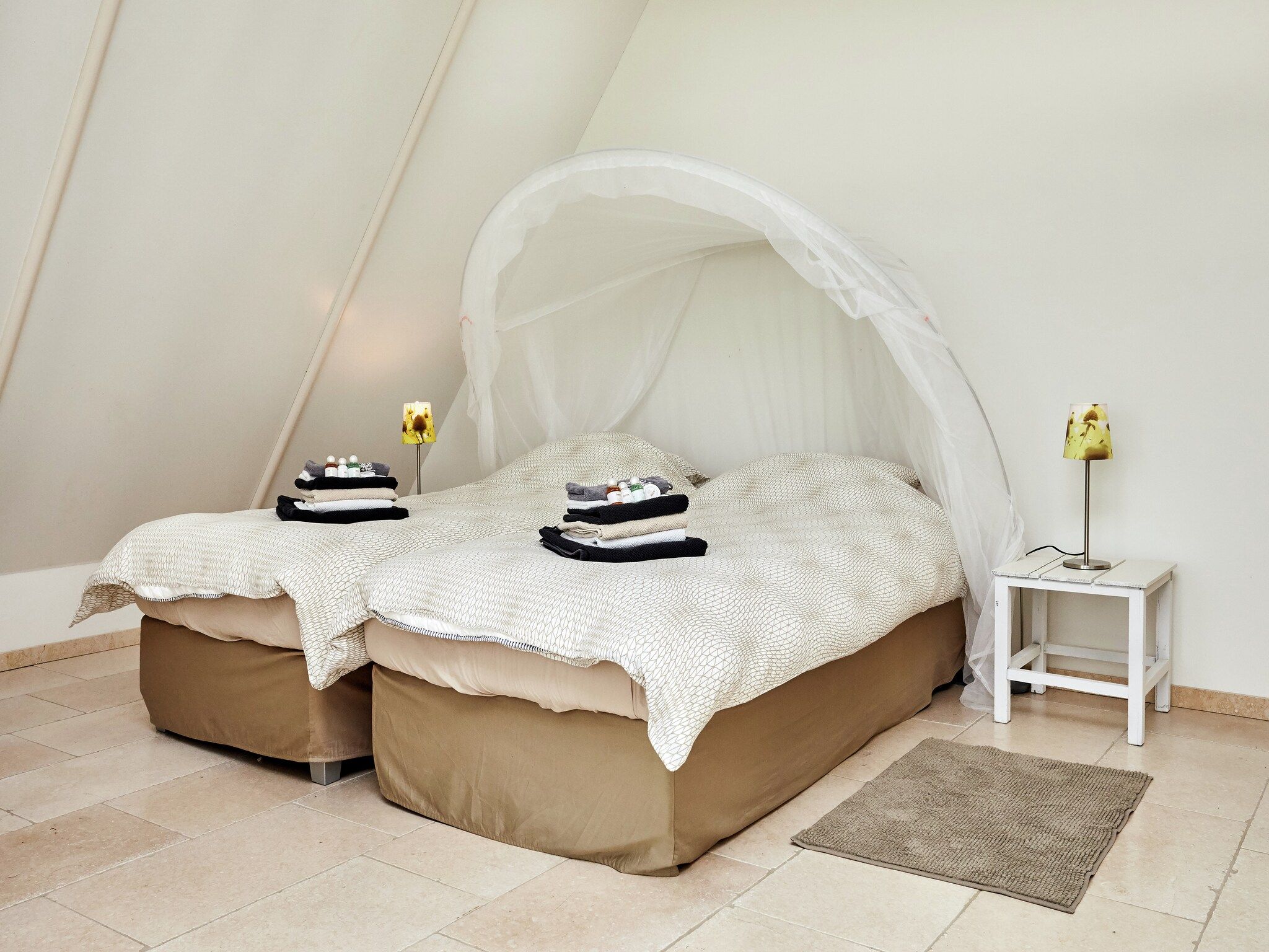 Een slaapkamer van Landhuis Wad Anders in Wierum