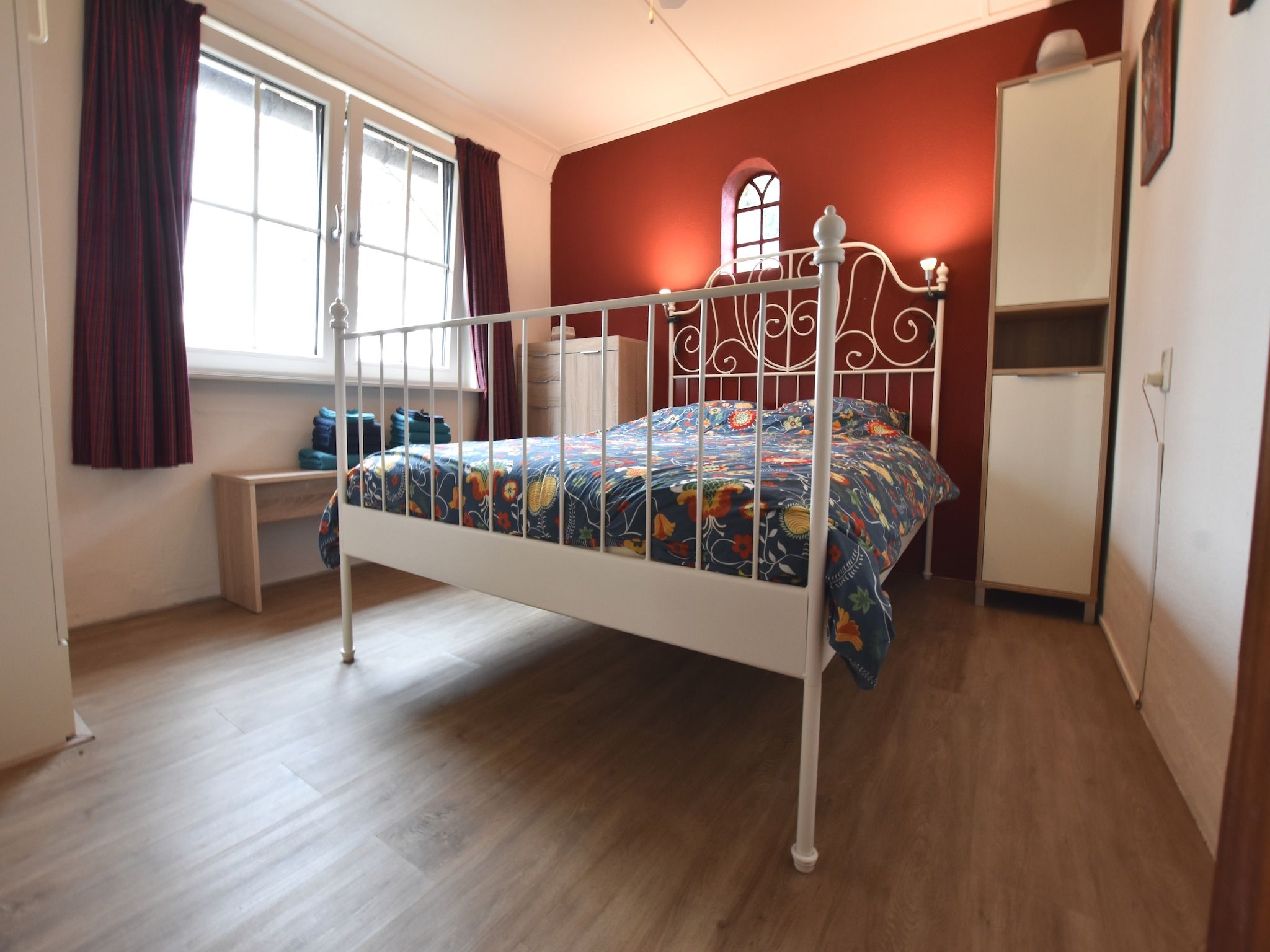 Een slaapkamer van De Merel in Den ham