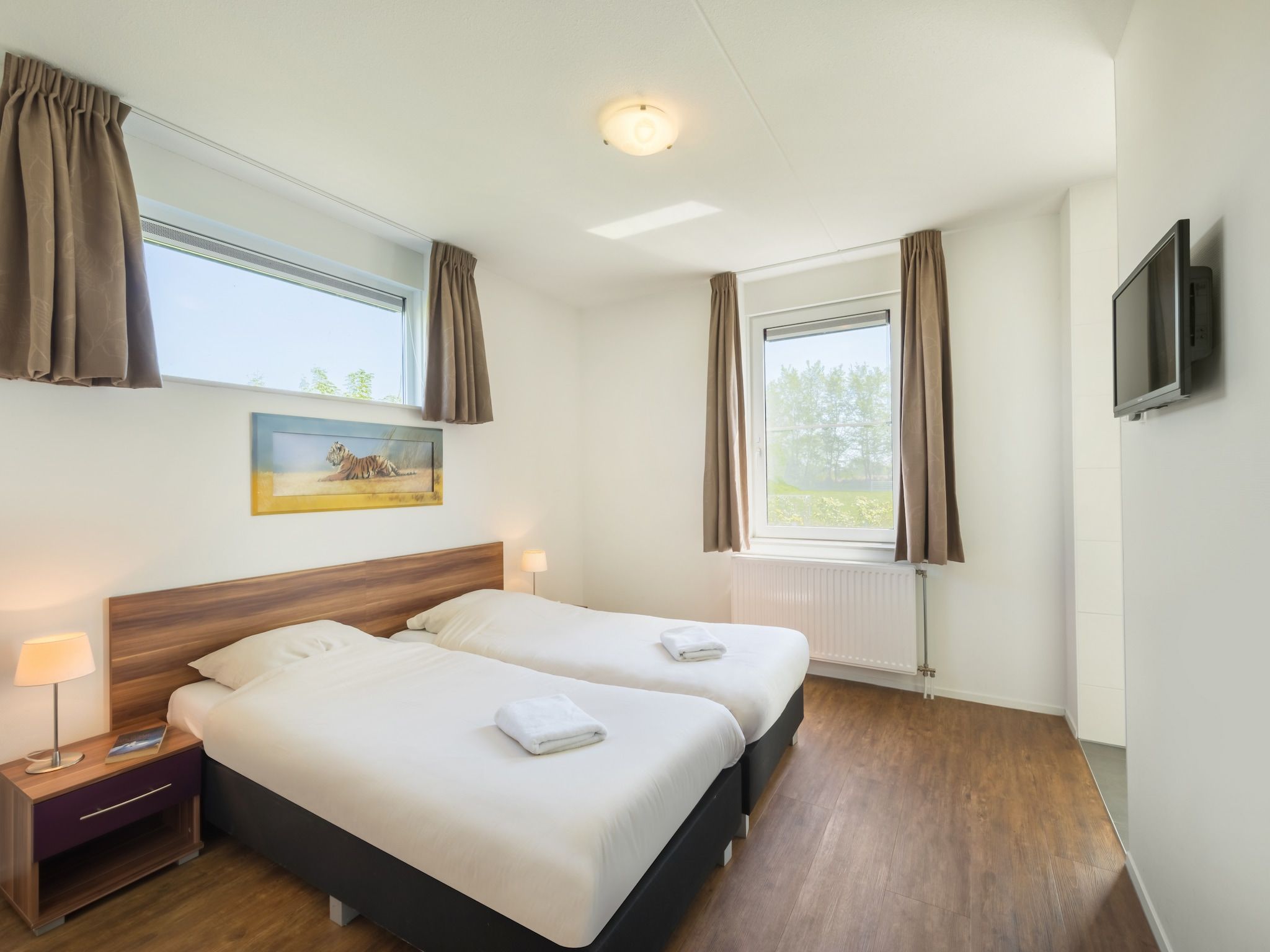 Een slaapkamer van Résidence de Weerribben 4 in Paasloo