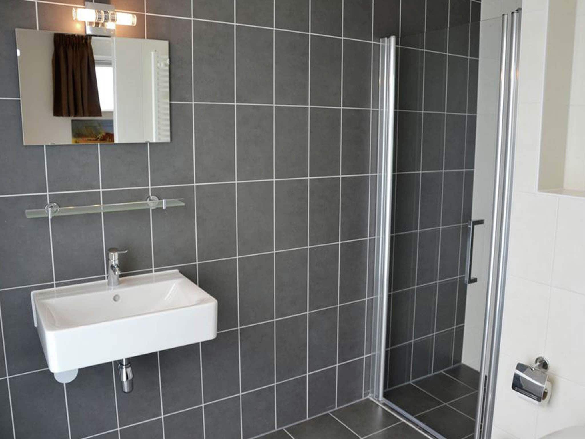 De badkamer van Résidence de Weerribben 1 in Paasloo