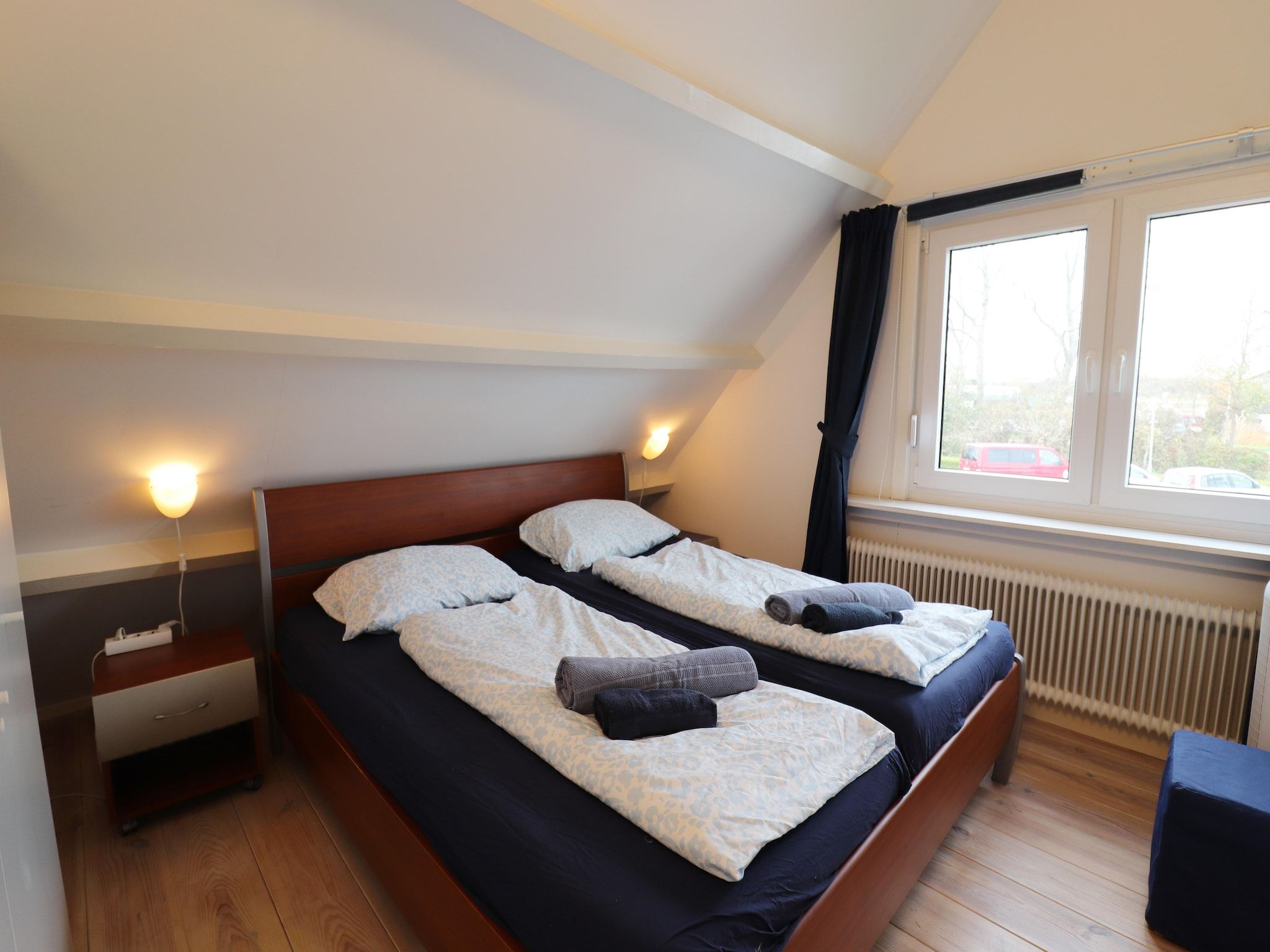 Een slaapkamer van Marie aan Zee in Noordwijkerhout