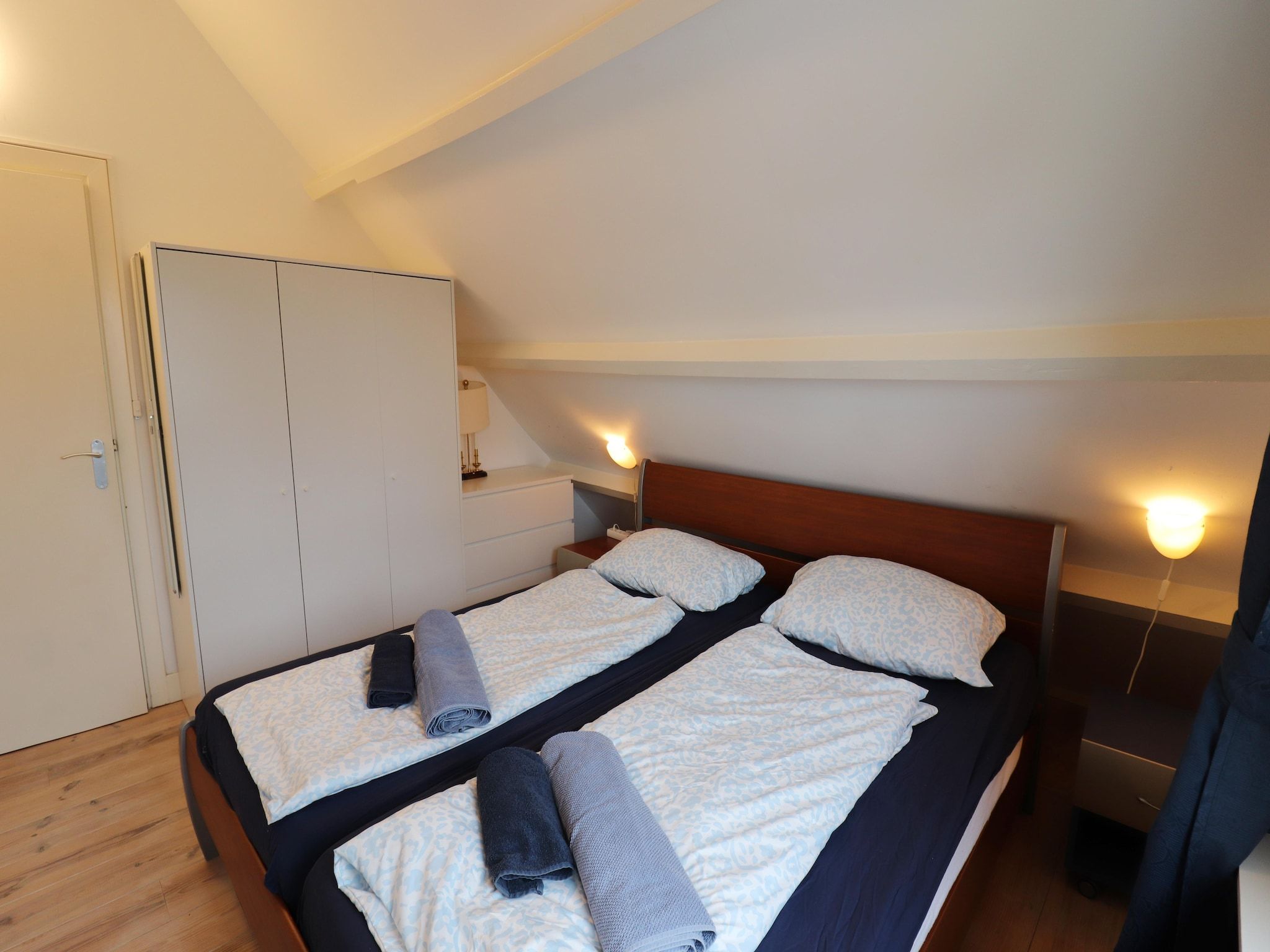 Een slaapkamer van Marie aan Zee in Noordwijkerhout