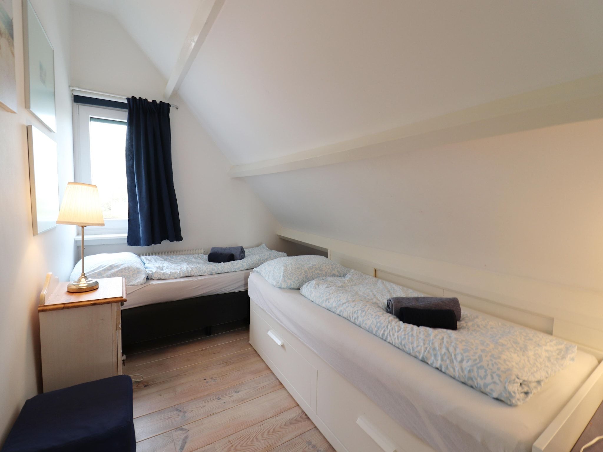 Een slaapkamer van Marie aan Zee in Noordwijkerhout