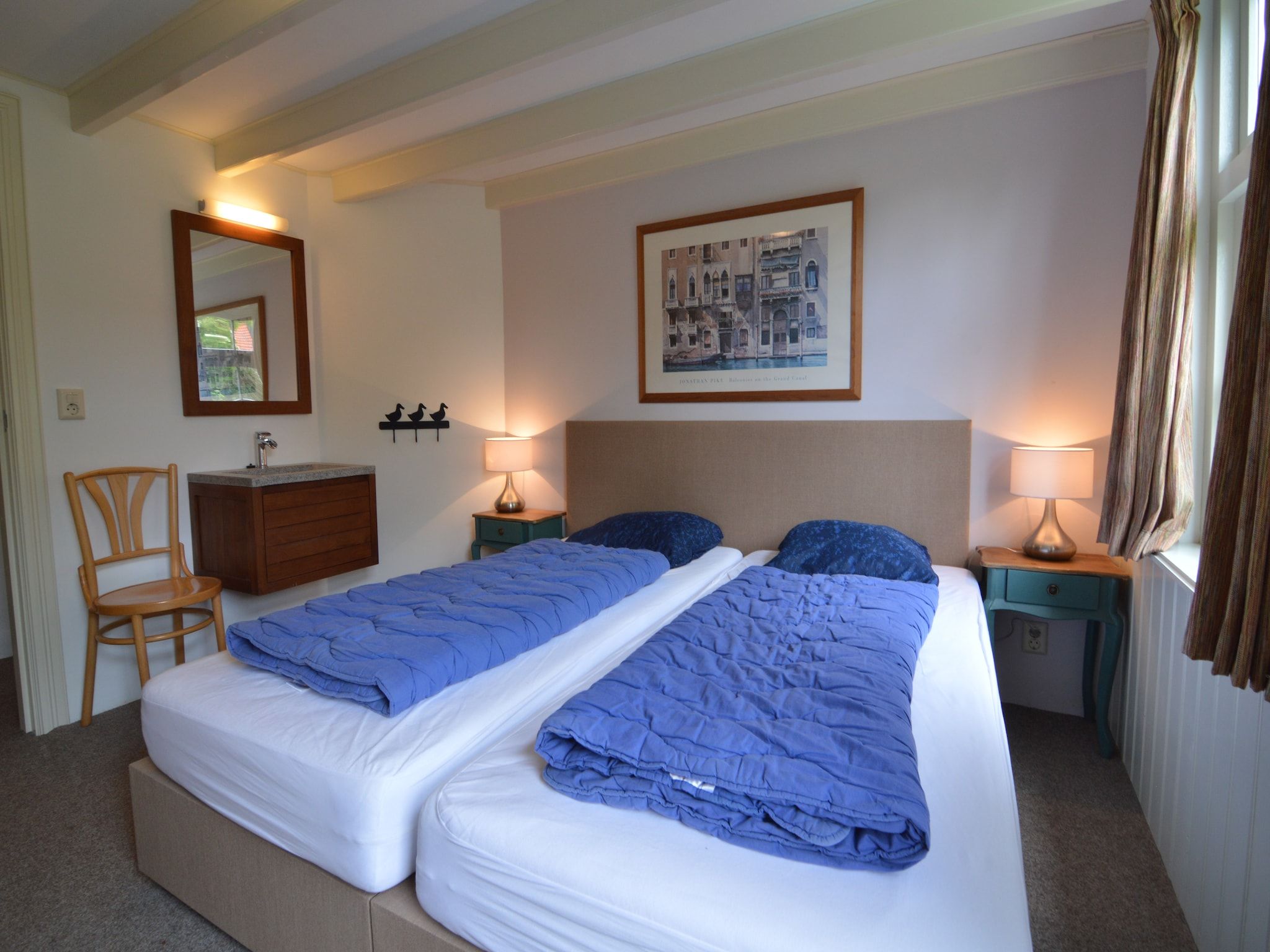 Een slaapkamer van Knook in Nieuwvliet