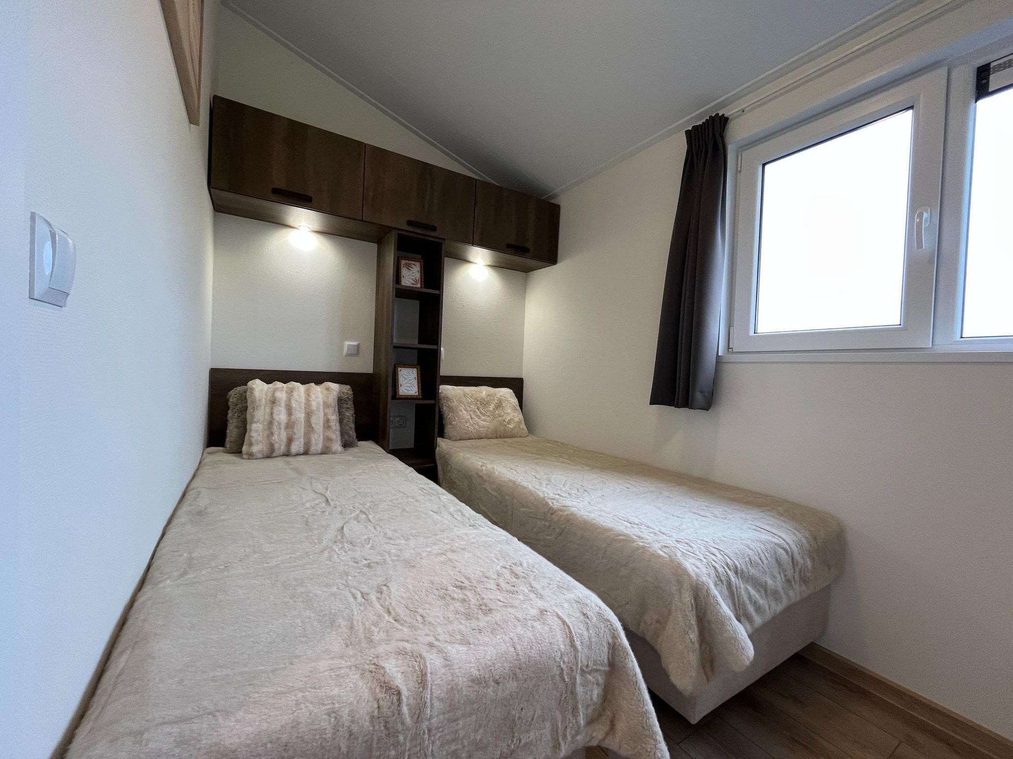 Een slaapkamer van Waaghuys  6 personen in West-Graftdijk