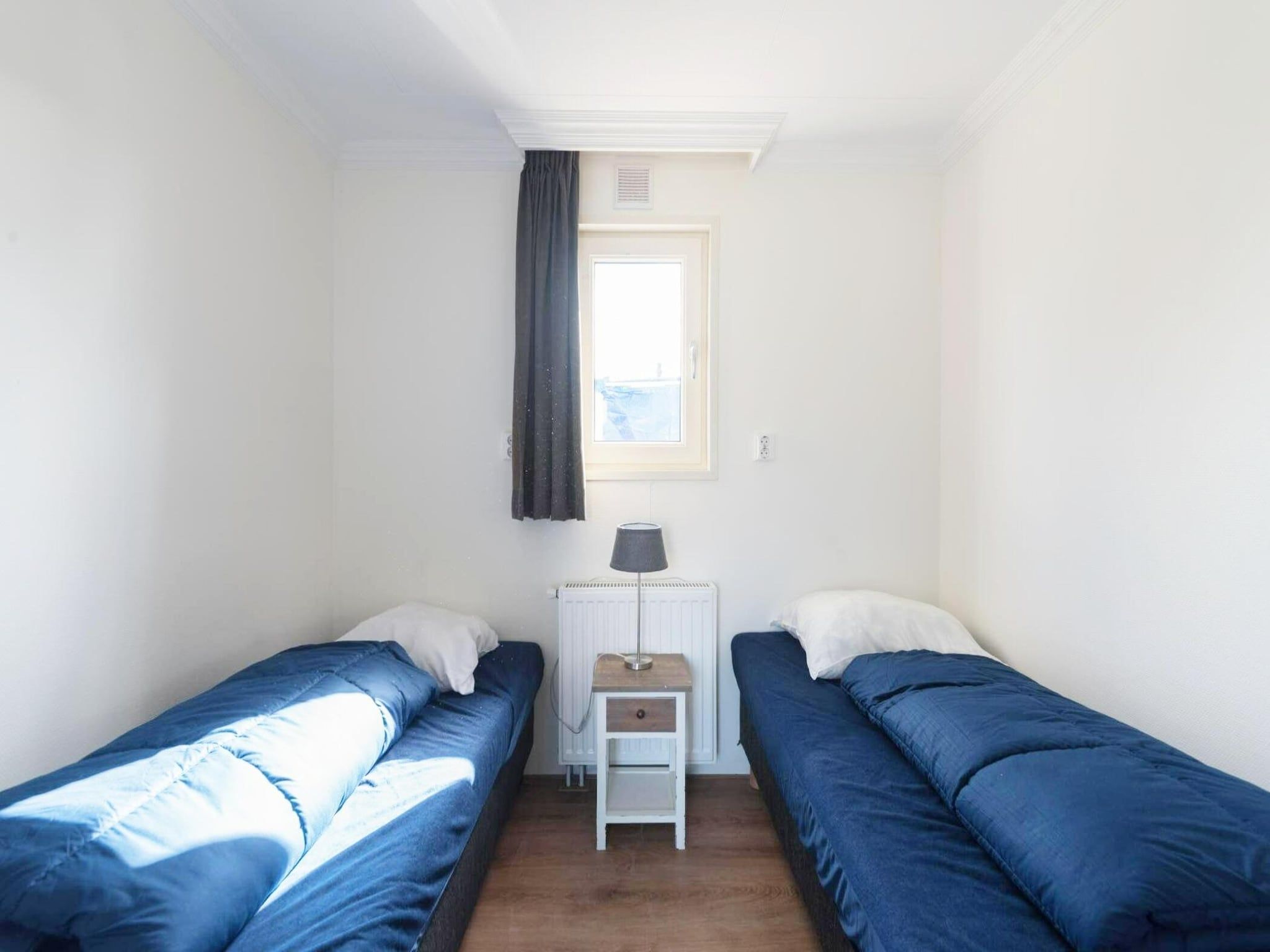 Een slaapkamer van De Edammer  6 personen in West-Graftdijk