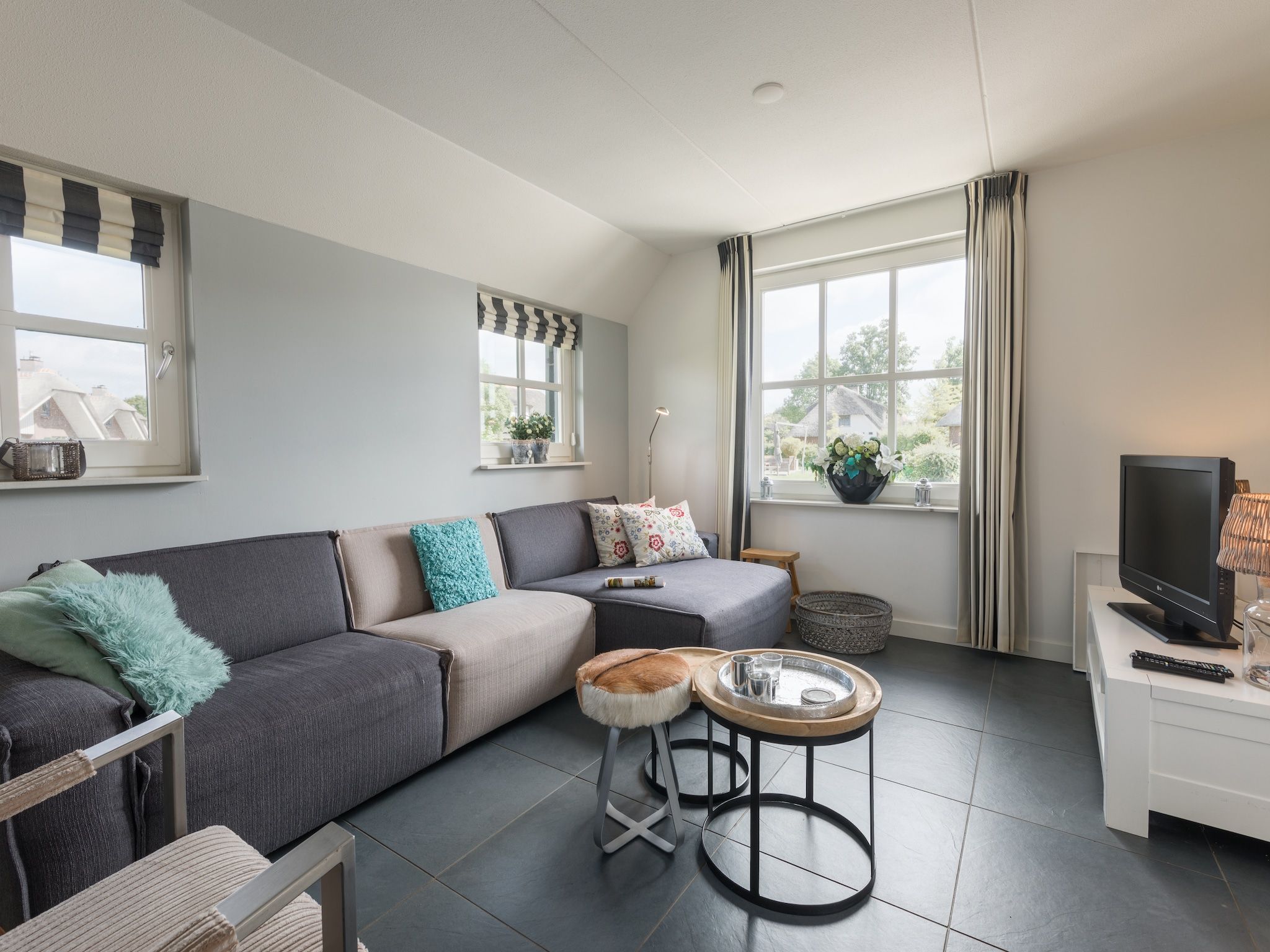 De woonkamer van Waterpark Belterwiede 2 in Wanneperveen