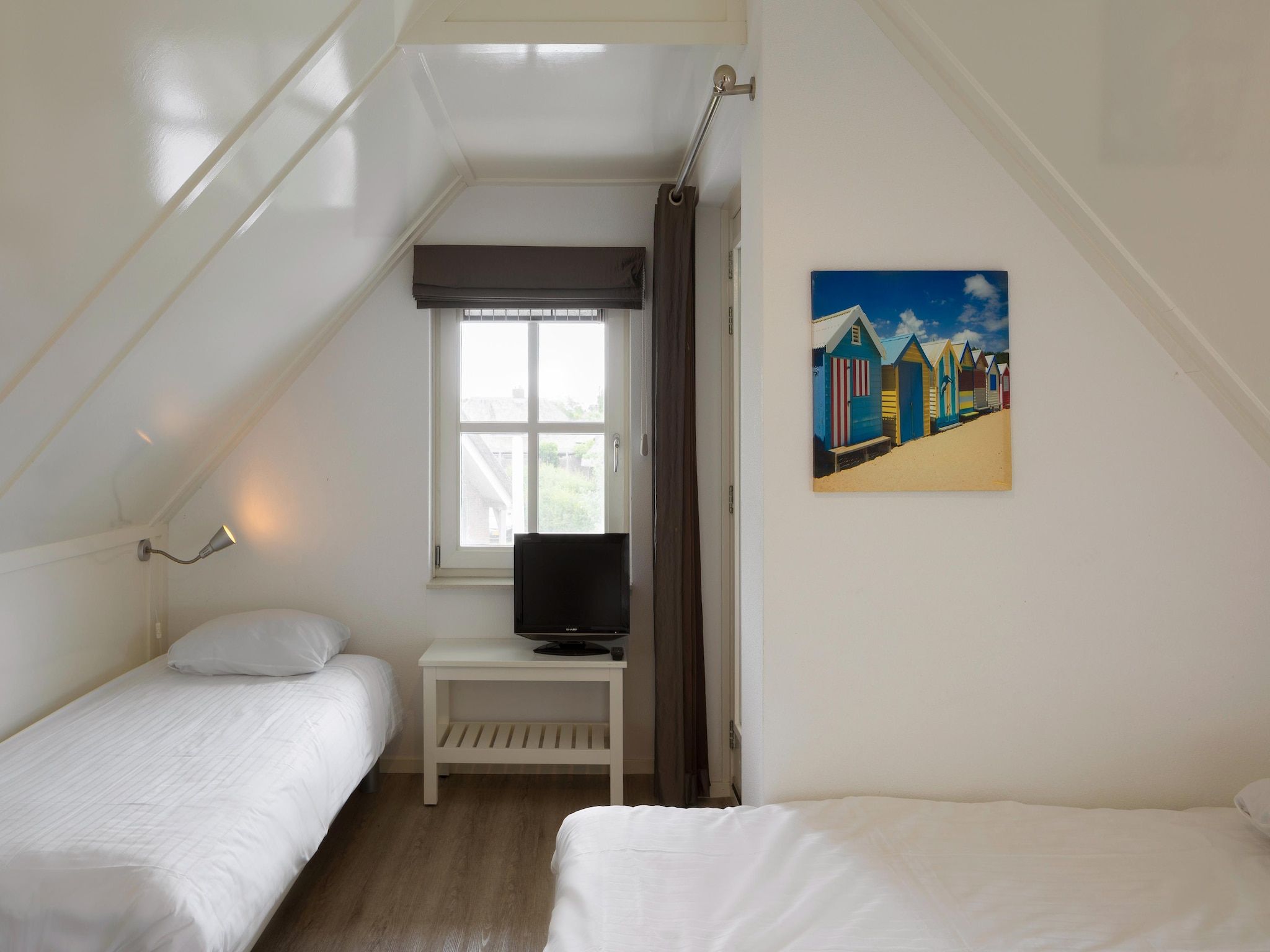 Een slaapkamer van Waterpark Belterwiede 2 in Wanneperveen