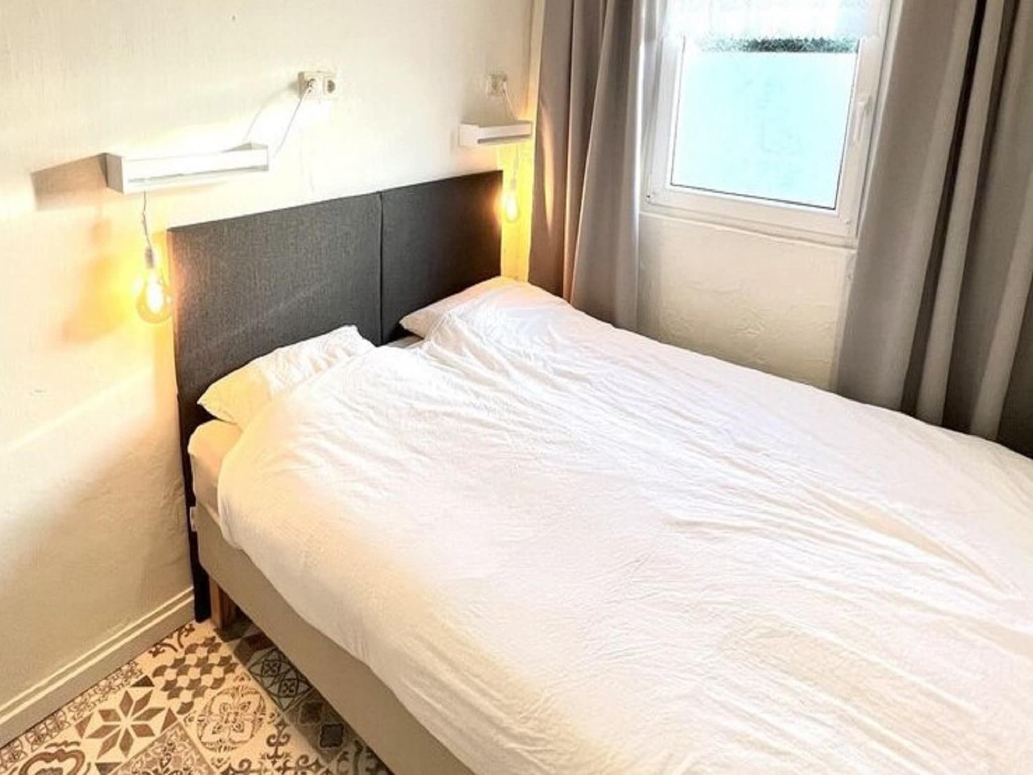 Een slaapkamer van Bi-j Moppe Door in Nederweert Eind