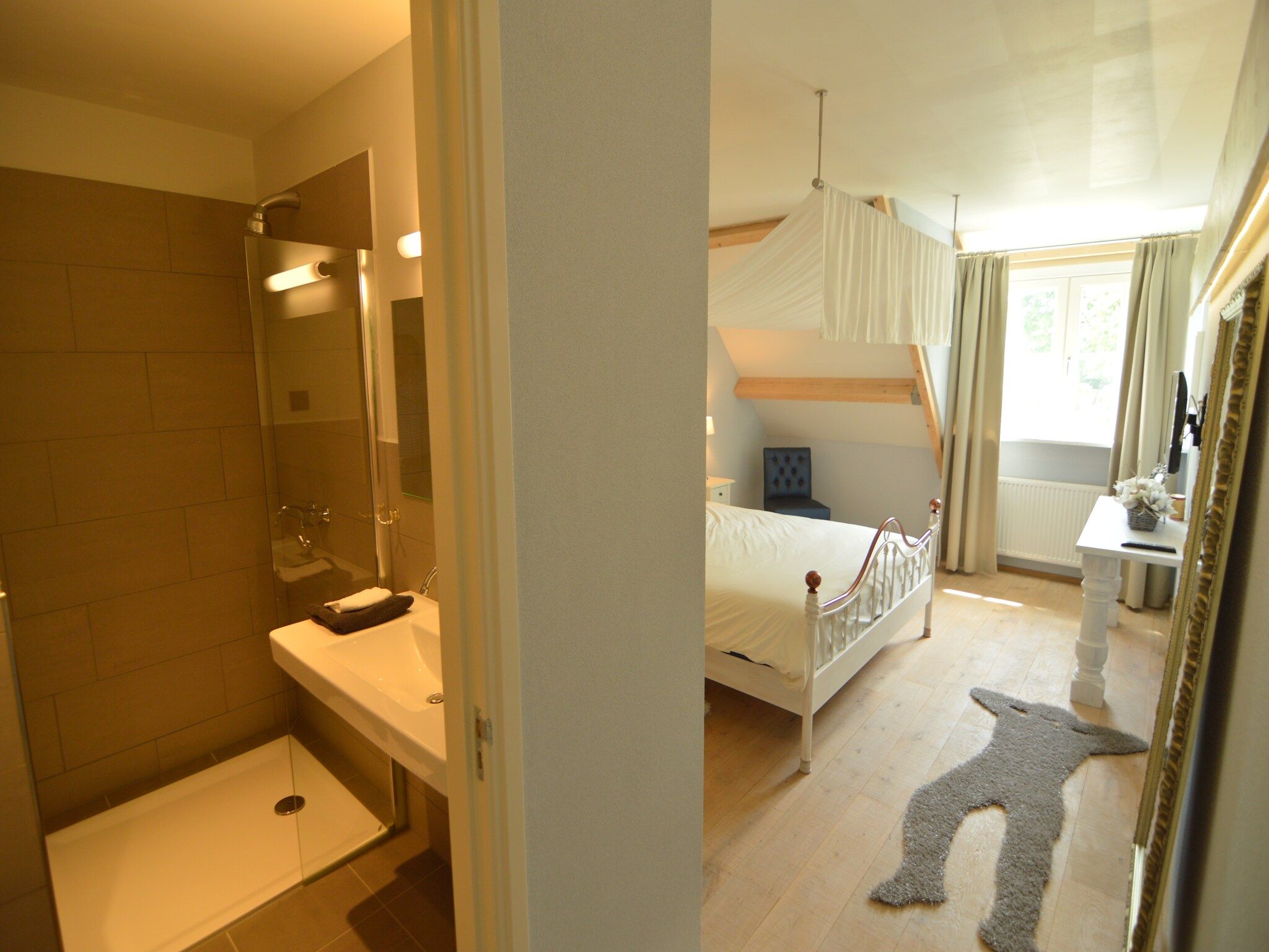 Een slaapkamer van Tramutana in Haaren