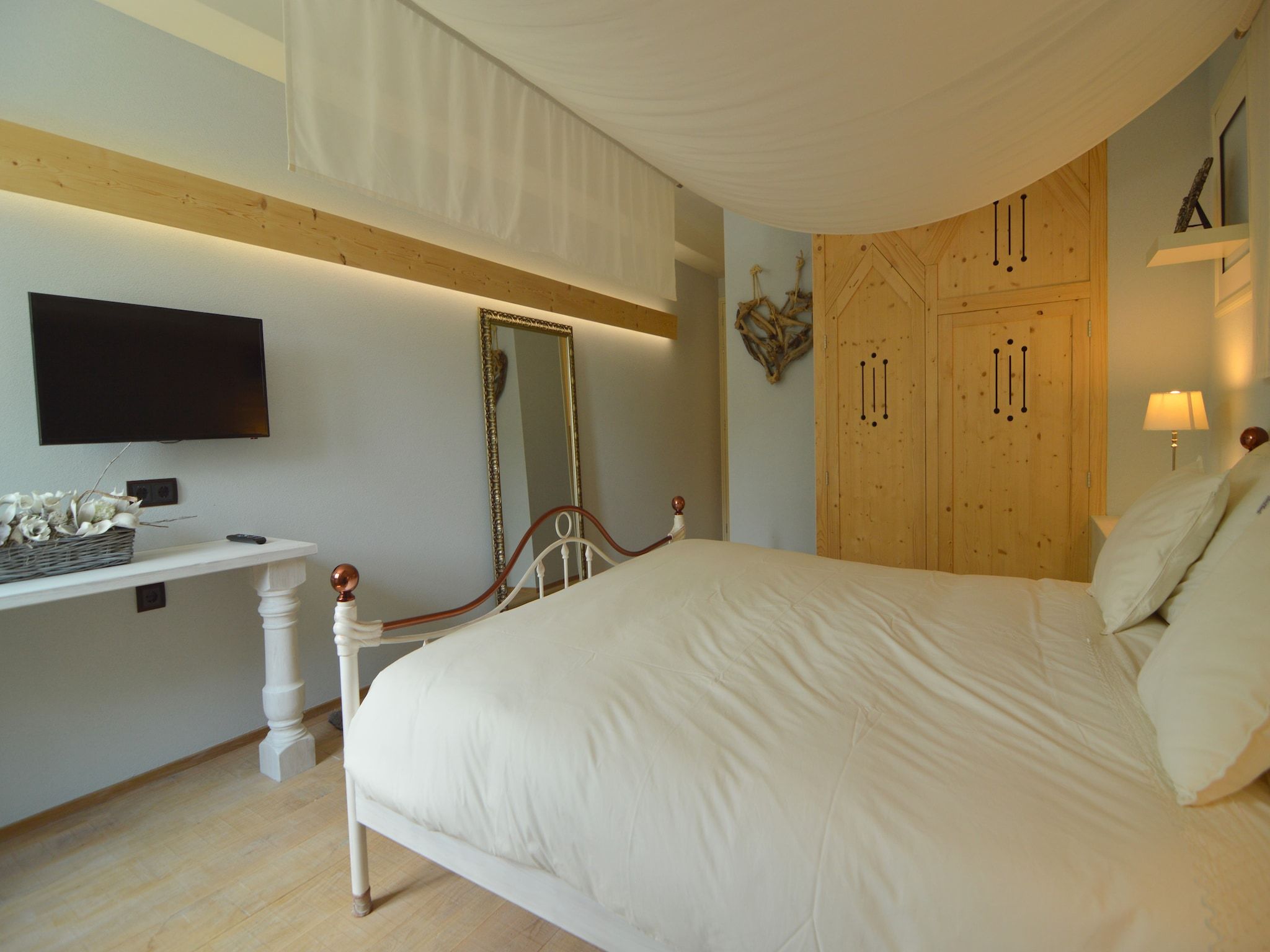 Een slaapkamer van Tramutana in Haaren