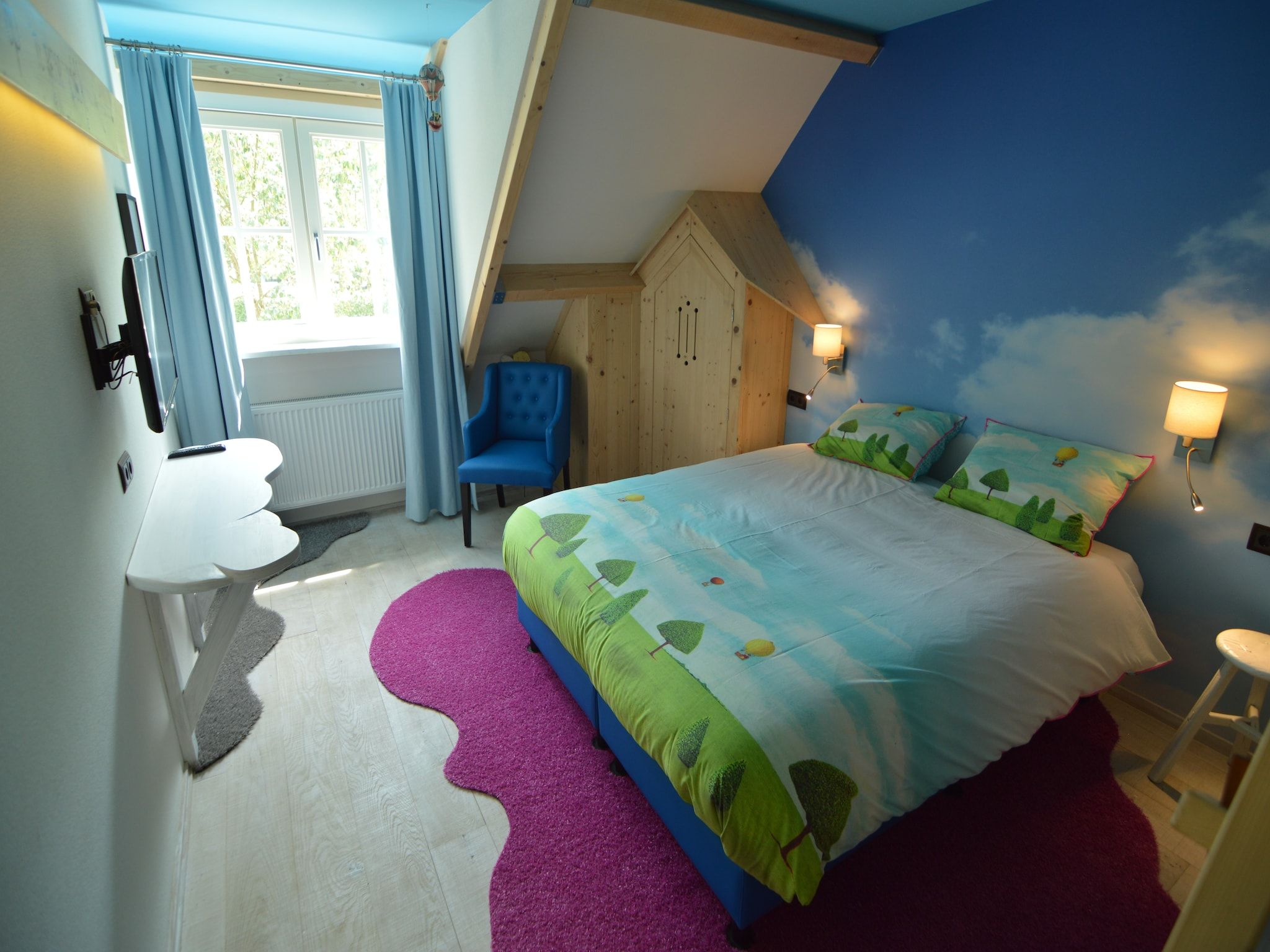 Een slaapkamer van Tramutana in Haaren