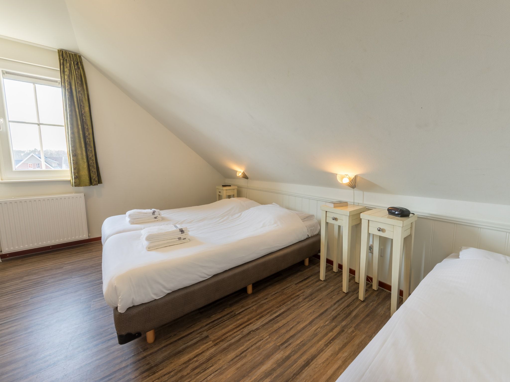 Een slaapkamer van Résidence Klein Vink 3 in Arcen