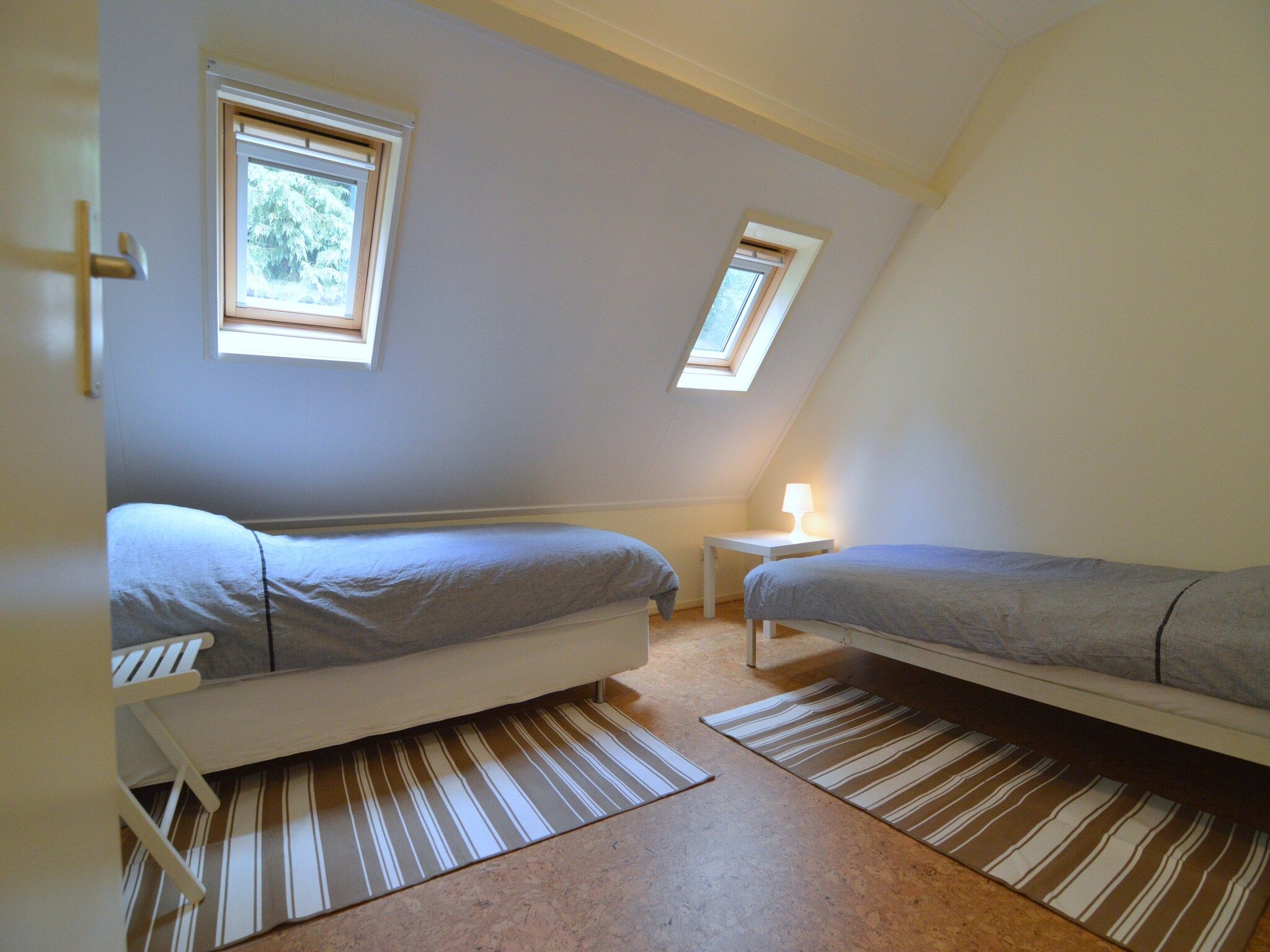 Een slaapkamer van Het Kruisselt in Zelhem