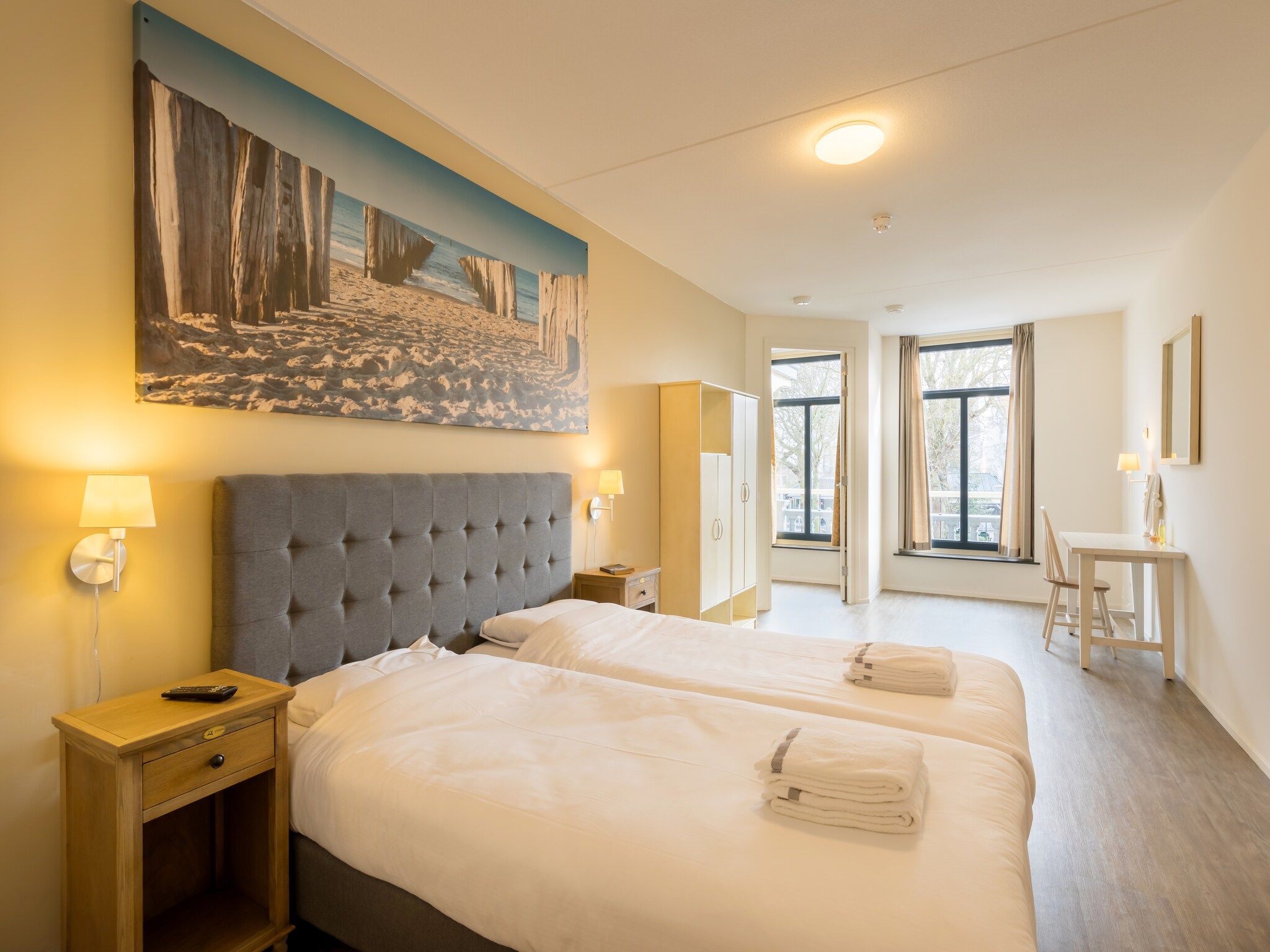 Een slaapkamer van Résidence Wijngaerde 9 in Domburg