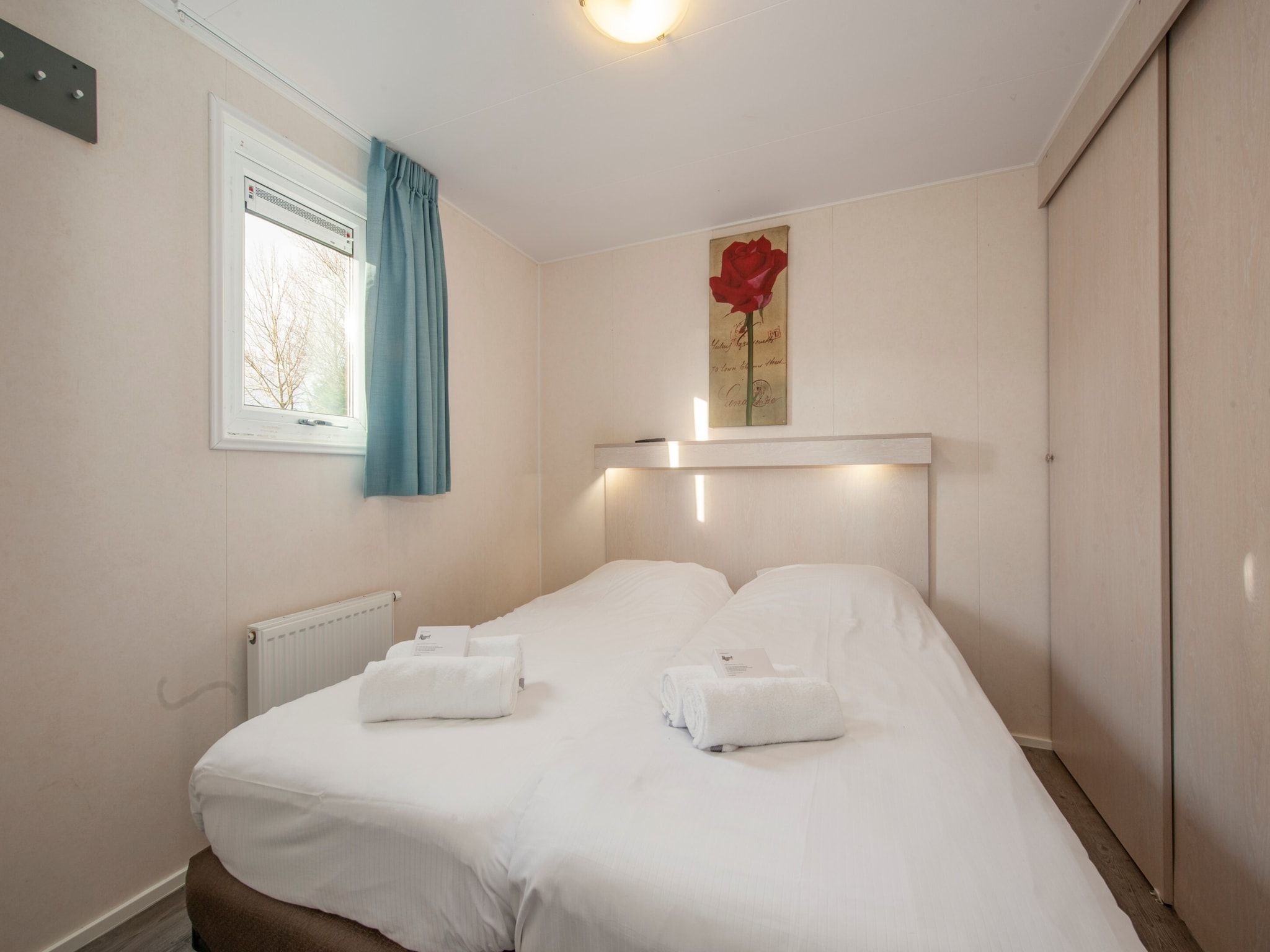 Een slaapkamer van Vakantiepark Beach Resort 1 in Kamperland